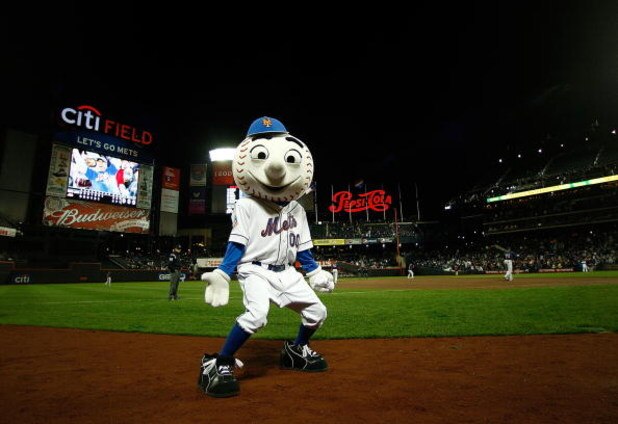 NEW YORK - APRIL 03:  Mr Met  gets the crowd going during an exhibition game between the New York Mets and the Boston Red Sox on April 3, 2009 at Citi Field in the Flushing neighborhood of the Queens borough of New York City. The game marks the first time