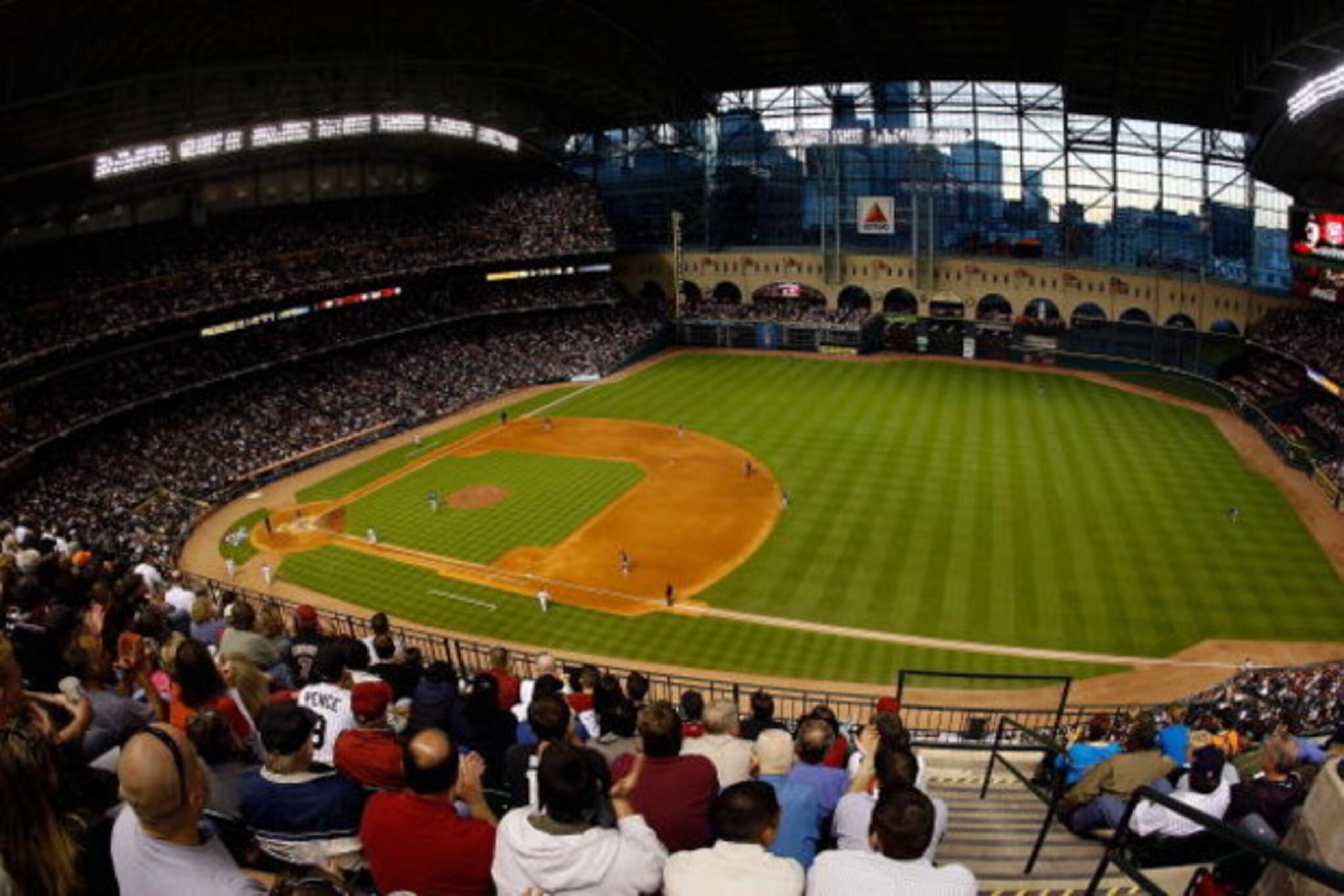 HOUSTON - APRIL 06:  Fans watch the Opening Day game between the Chicago Cubs and the Houston Astros on April 6, 2009 at Minute Maid Park in Houston, Texas.  (Photo by Chris Graythen/Getty Images)