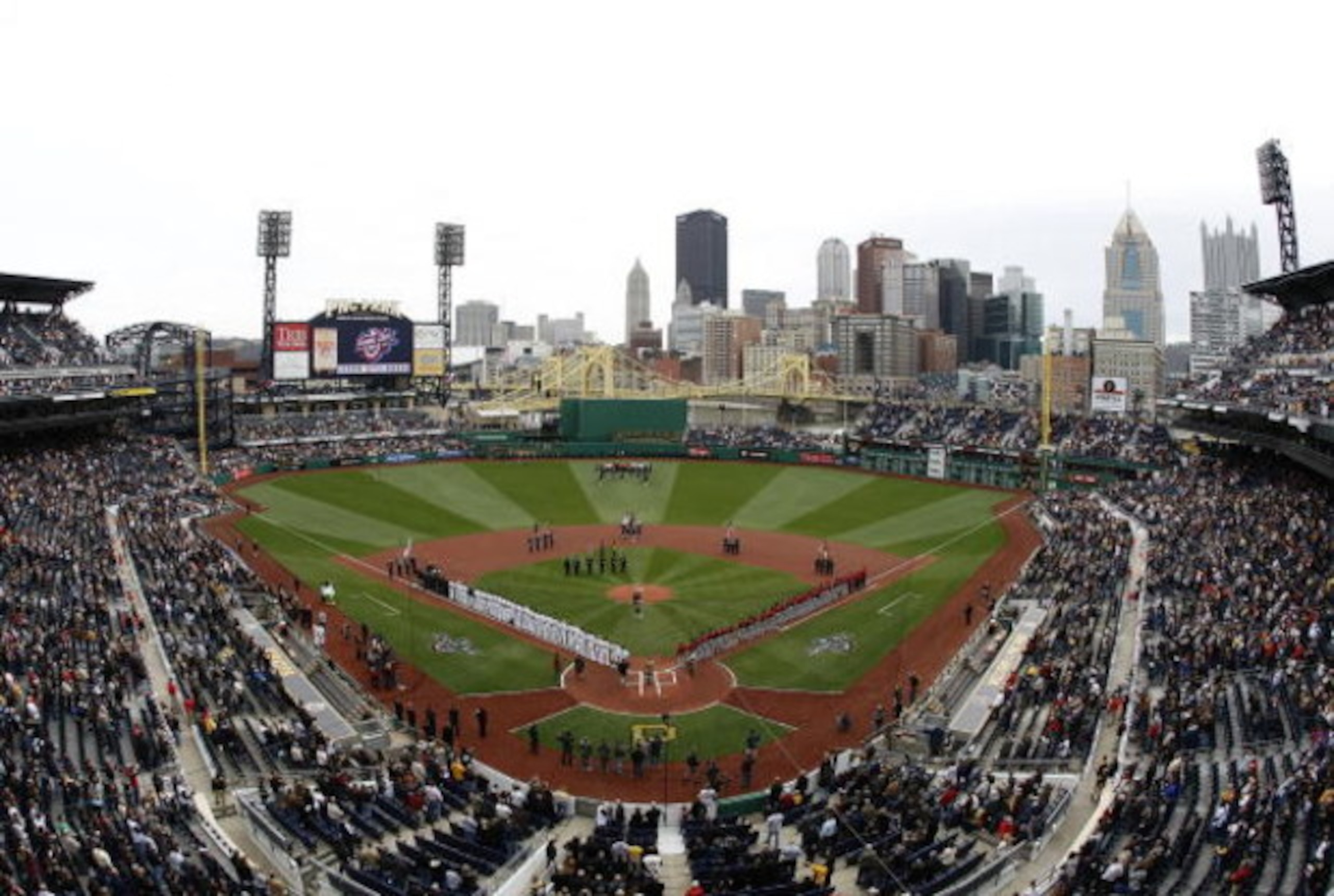PITTSBURGH - APRIL 13: The Pittsburgh Pirates and Houston Astros look on while the National Anthem is performed during the Pirates Home Opener at PNC Park April 13, 2009 in Pittsburgh, Pennsylvania.  (Photo by Gregory Shamus/Getty Images)