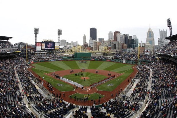 PITTSBURGH - APRIL 13: The Pittsburgh Pirates and Houston Astros look on while the National Anthem is performed during the Pirates Home Opener at PNC Park April 13, 2009 in Pittsburgh, Pennsylvania.  (Photo by Gregory Shamus/Getty Images)