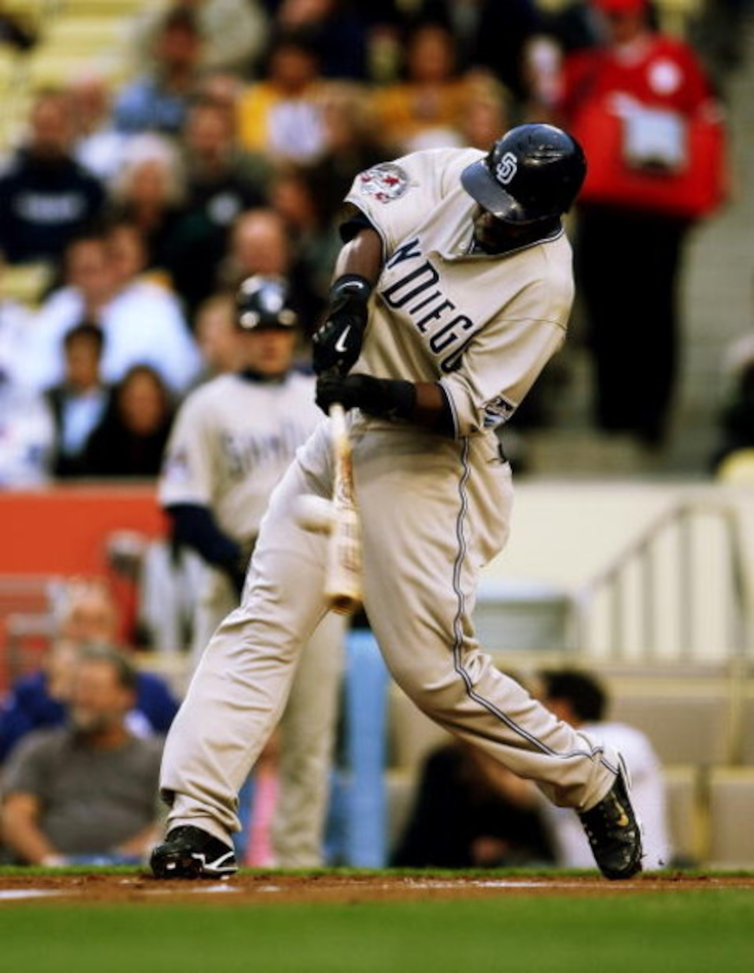 LOS ANGELES - JUNE 9:  Tony Gwynn #18 of the San Diego Padres hits a leadoff single in the first inning against the Los Angeles Dodgers on June 9, 2009 at Dodger Stadium in Los Angeles, California.  (Photo by Stephen Dunn/Getty Images)