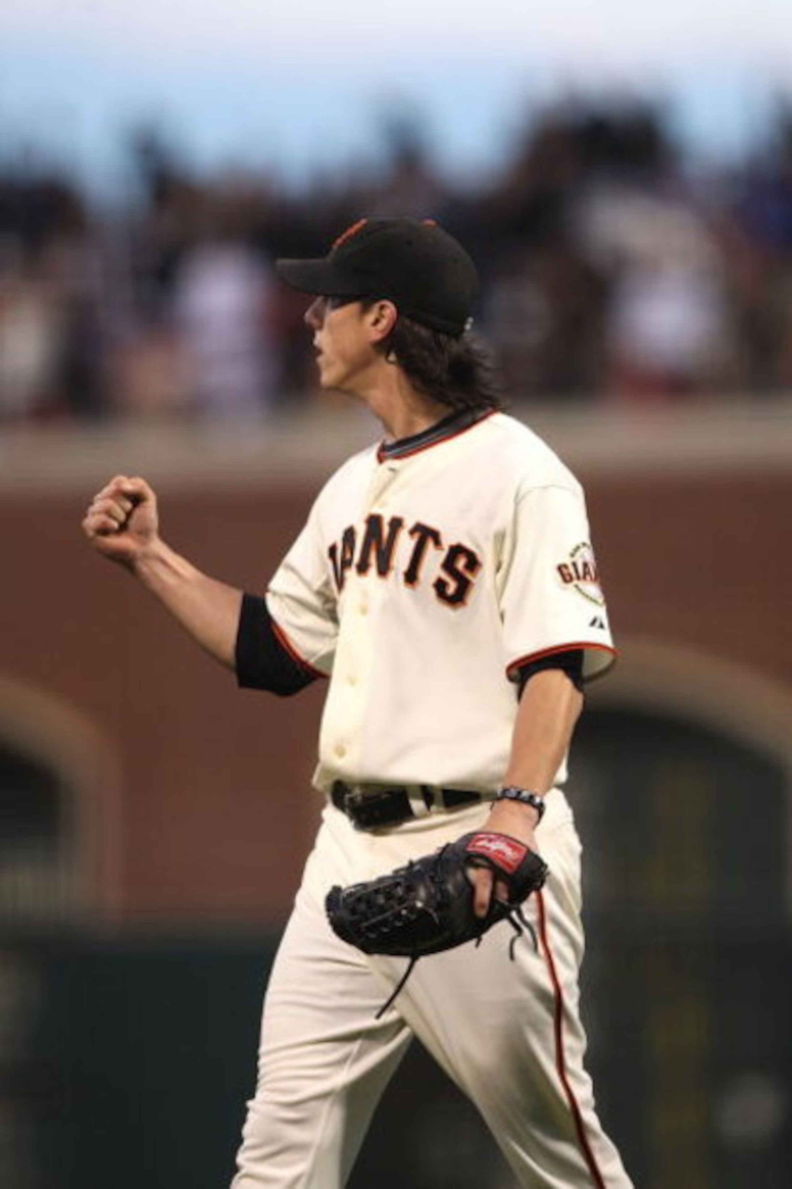 SAN FRANCISCO - AUGUST 01:  Tim Lincecum #55 of the San Francisco Giants reacts after getting the last out in the 8th inning against the Philadelphia Phillies during a Major League Baseball game at AT&T Park on August 1, 2009 in San Francisco, California.