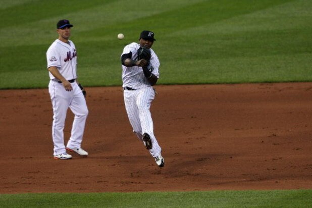 ST. LOUIS, MO - JULY 14:  National League All-Star Hanley Ramirez of the Florida Marlins throws as David Wright of the New York Mets looks on during the 2009 MLB All-Star Game at Busch Stadium on July 14, 2009 in St Louis, Missouri. (Photo by Elsa/Getty I