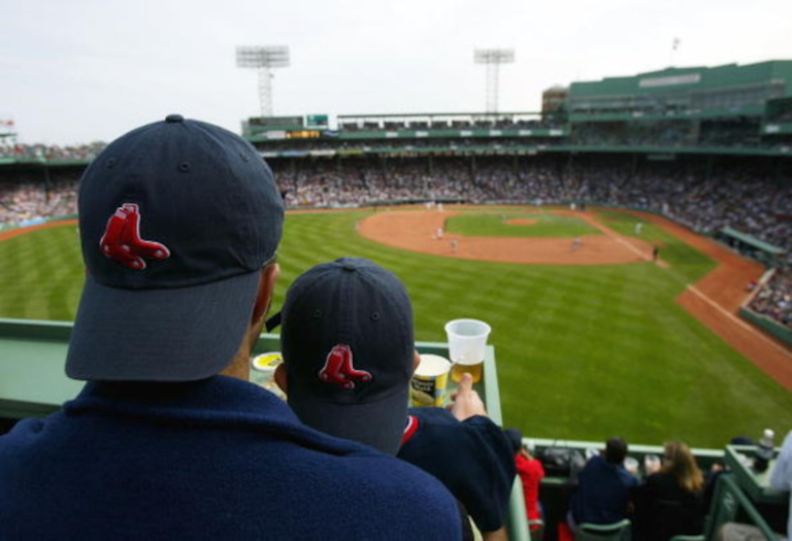 BOSTON - APRIL 18:  A general view from a top the Green Monster of fans as they watch their Boston Red Sox play against the New York Yankees on April 18, 2004 at Fenway Park in Boston, Massachusetts. The Yanees won 7-3. (Photo by Ezra Shaw/Getty Images)