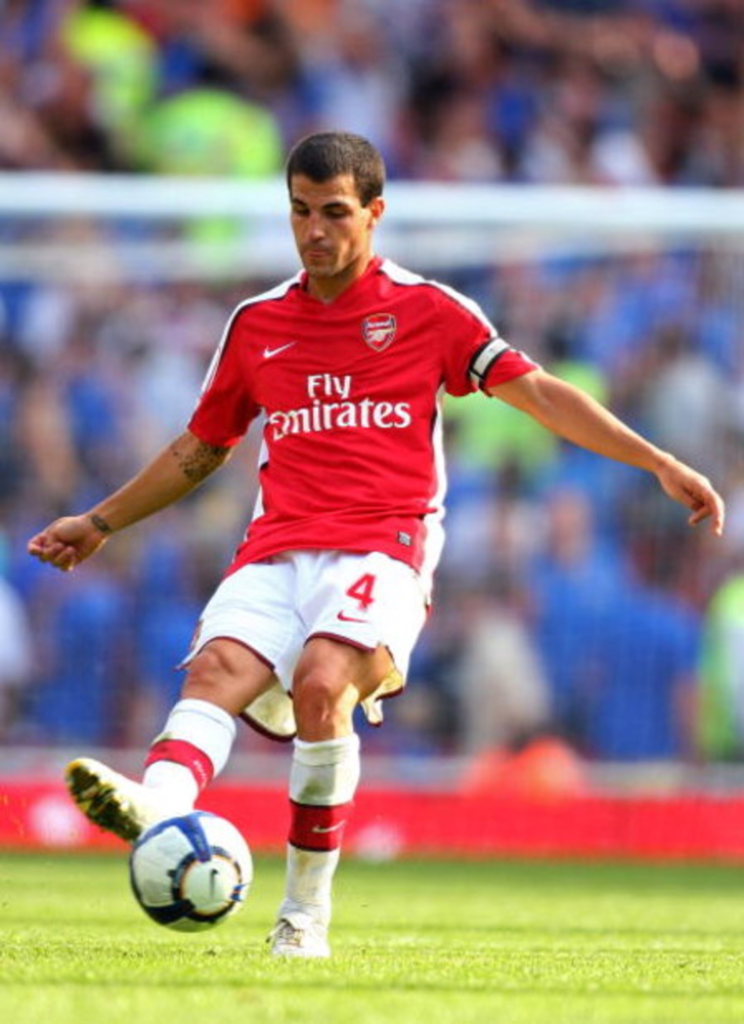 LONDON, ENGLAND - AUGUST 02:  Cesc Fabregas of Arsenal passes the ball during the Emirates Cup match between Arsenal and Glasgow Rangers at the Emirates Stadium on August 2, 2009 in London, England.  (Photo by Phil Cole/Getty Images)