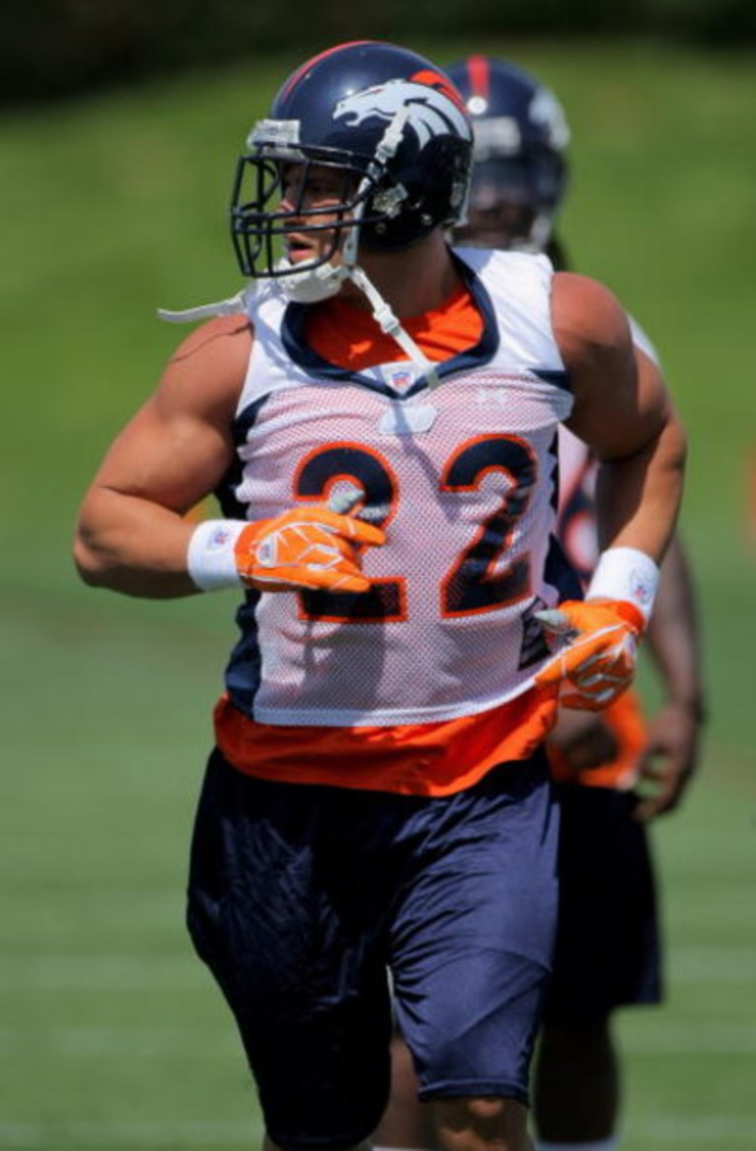 ENGLEWOOD, CO - JUNE 12:  Running back Peyton Hillis #22 of the Denver Broncos warms up during minicamp practice at the Broncos Dove Valley training facility on June 12, 2009 in Englewood, Colorado.  (Photo by Doug Pensinger/Getty Images)