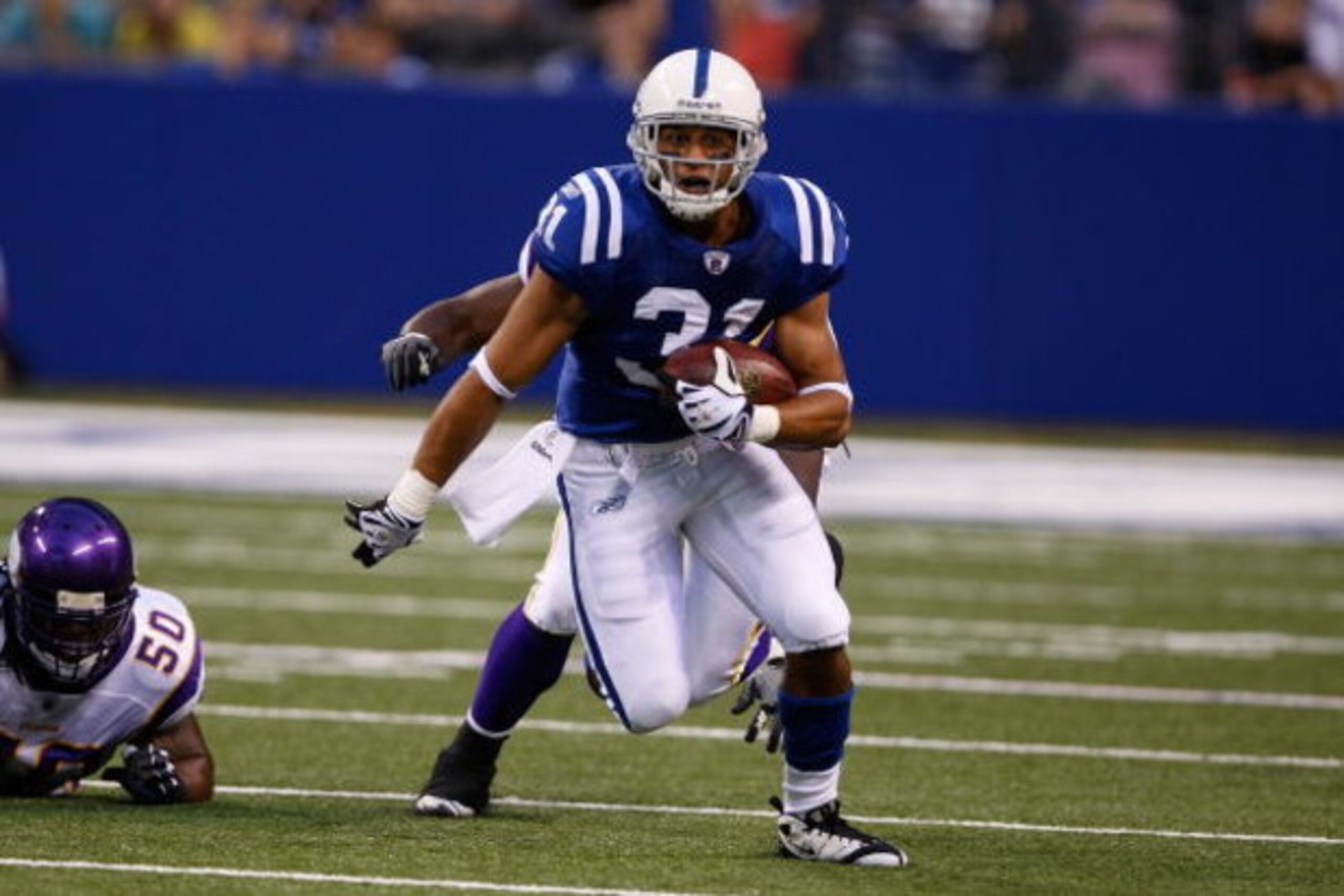 INDIANAPOLIS, IN - AUGUST 14: Running back Donald Brown #31 of the Indianapolis Colts runs with the football against the Minnesota Vikings at Lucas Oil Stadium on August 14, 2009 in Indianapolis, Indiana. (Photo by Scott Boehm/Getty Images)