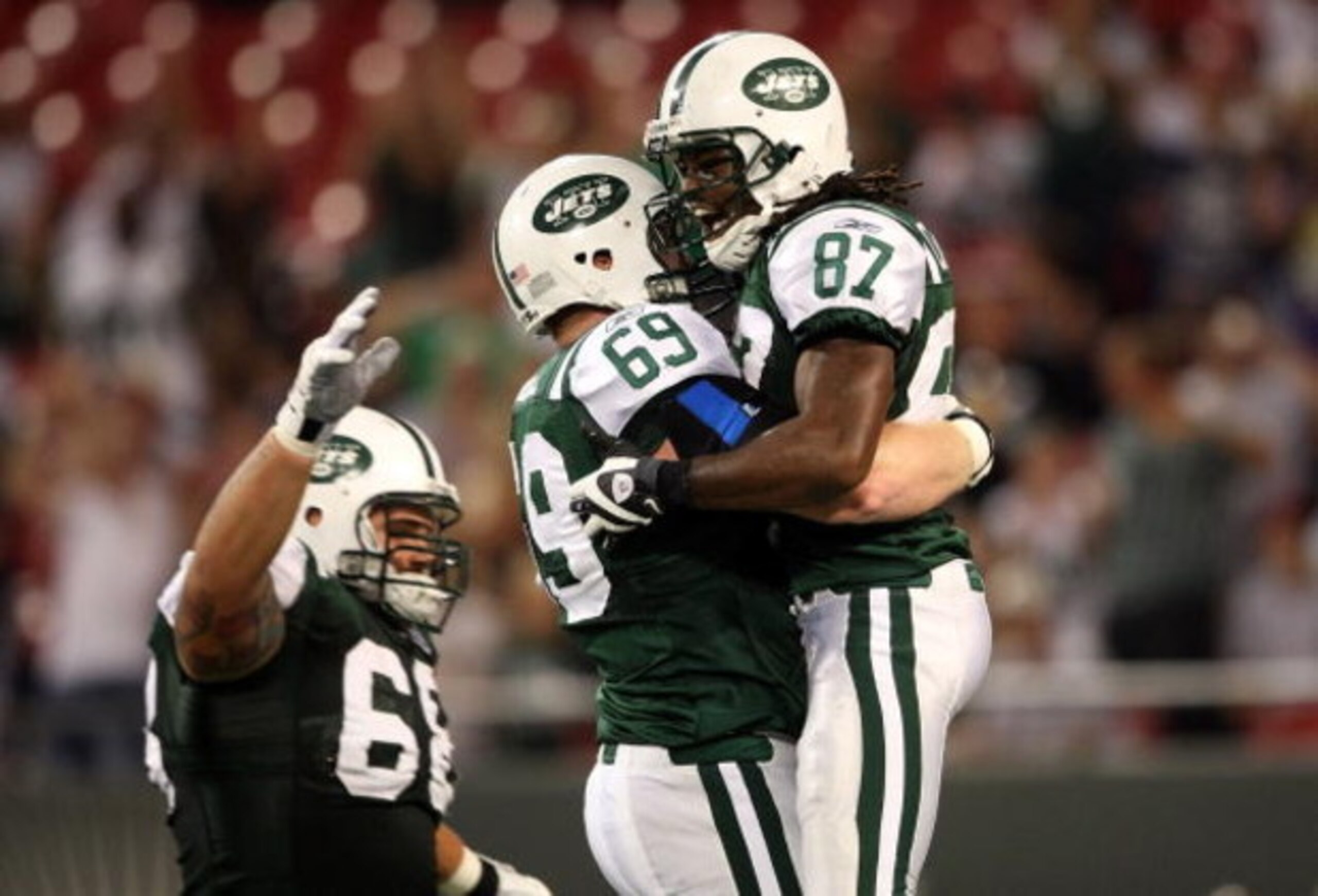 EAST RUTHERFORD, NJ - AUGUST 14:  David Clowney #87 of the New York Jets celebrates his touchdown with teammate Ryan McKee #69 against the St. Louis Rams during their preseason game at Giants Stadium on August 14, 2009  in East Rutherford, New Jersey.  (P