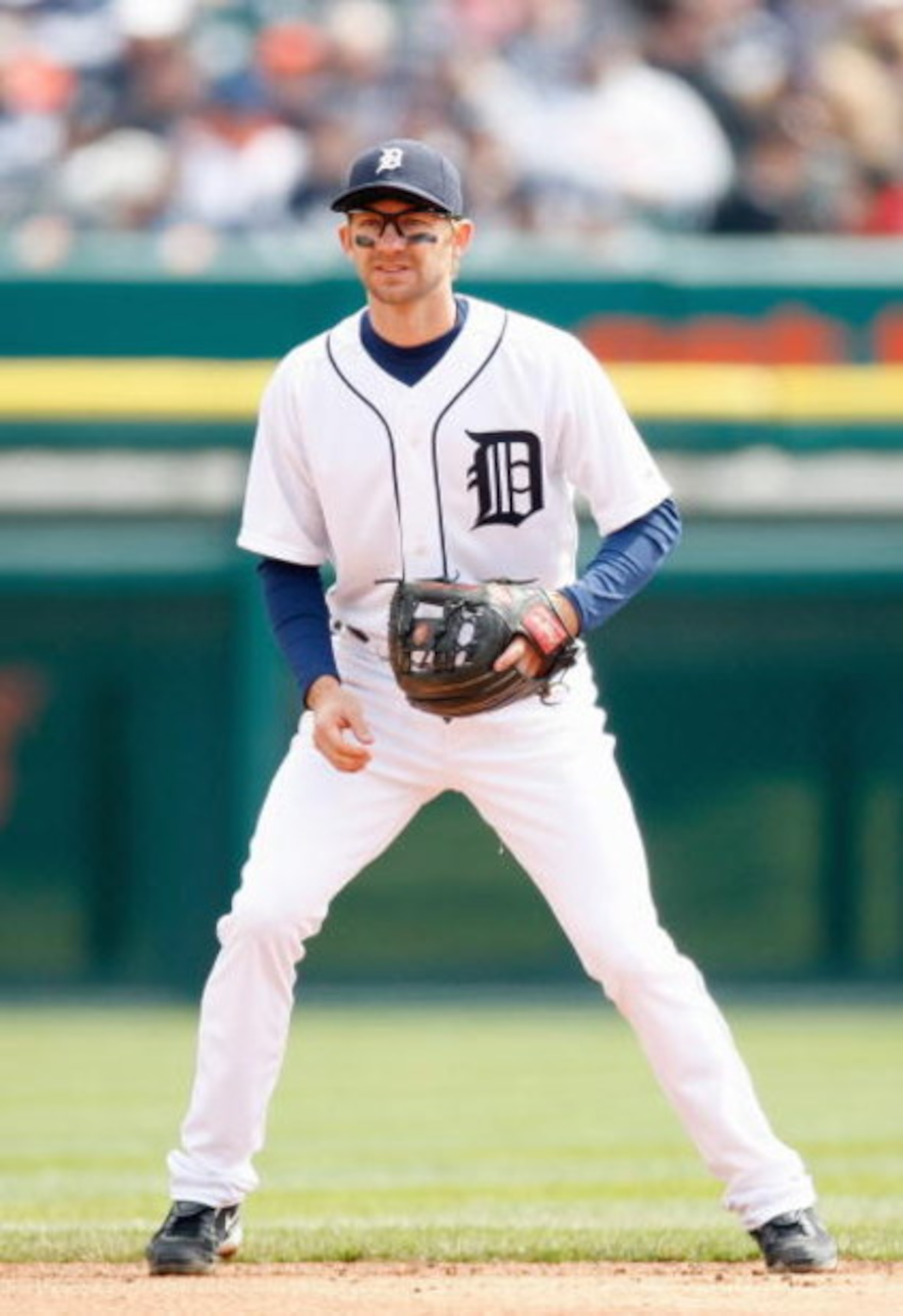 DETROIT - APRIL 10:  Adam Everett #4 of the Detroit Tigers gets ready infield against the Texas Rangers during Opening Day on April 10, 2009 at Comerica Park in Detroit, Michigan. Detroit won the game 15-2. (Photo by Gregory Shamus/Getty Images)
