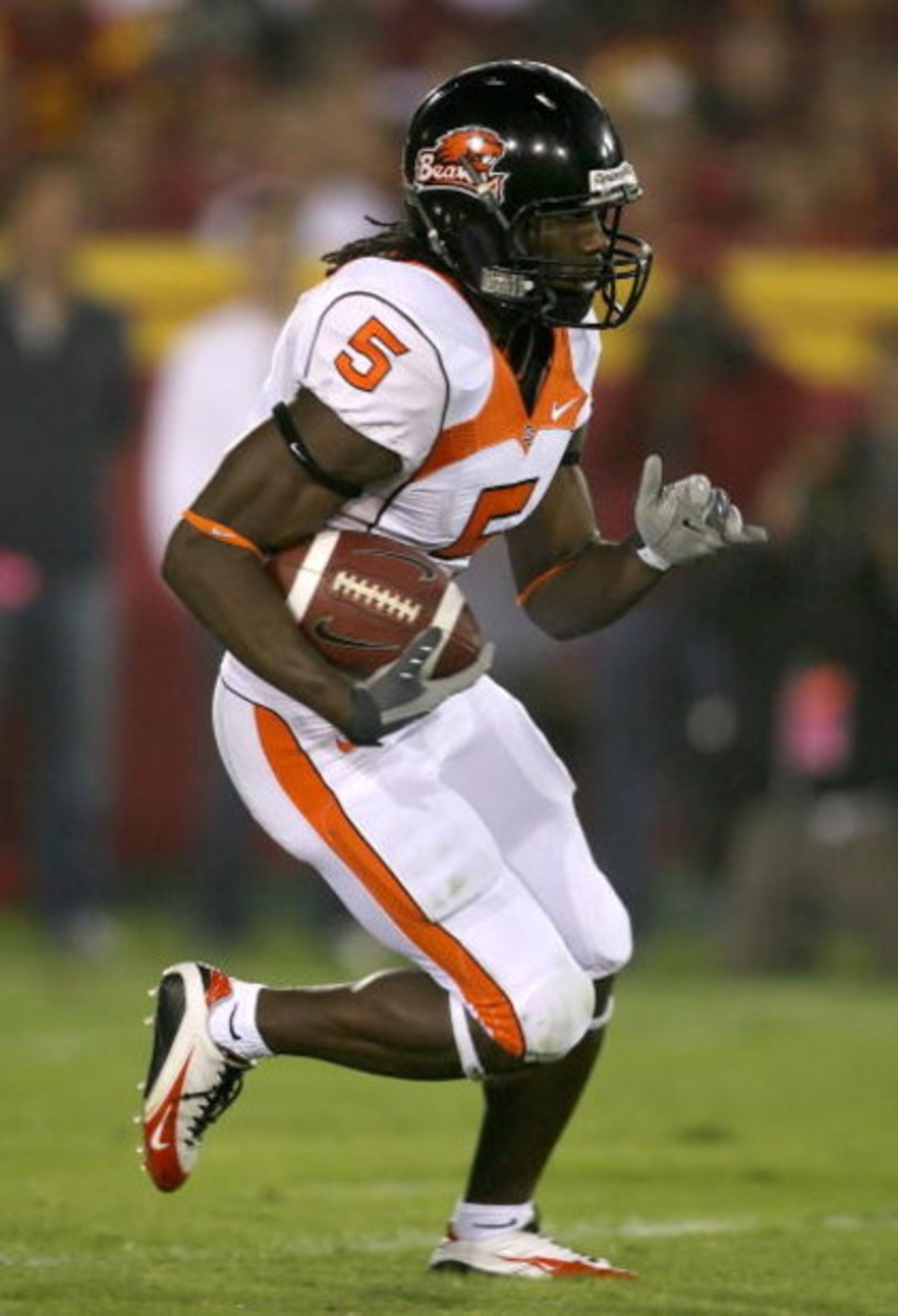 LOS ANGELES, CA - NOVEMBER 03:  Gerard Lawson #5 of the Oregon State Beavers runs with the football during the college football game against the USC Trojans at the Los Angeles Memorial Coliseum on November 3, 2007 in Los Angeles, California. USC defeated 