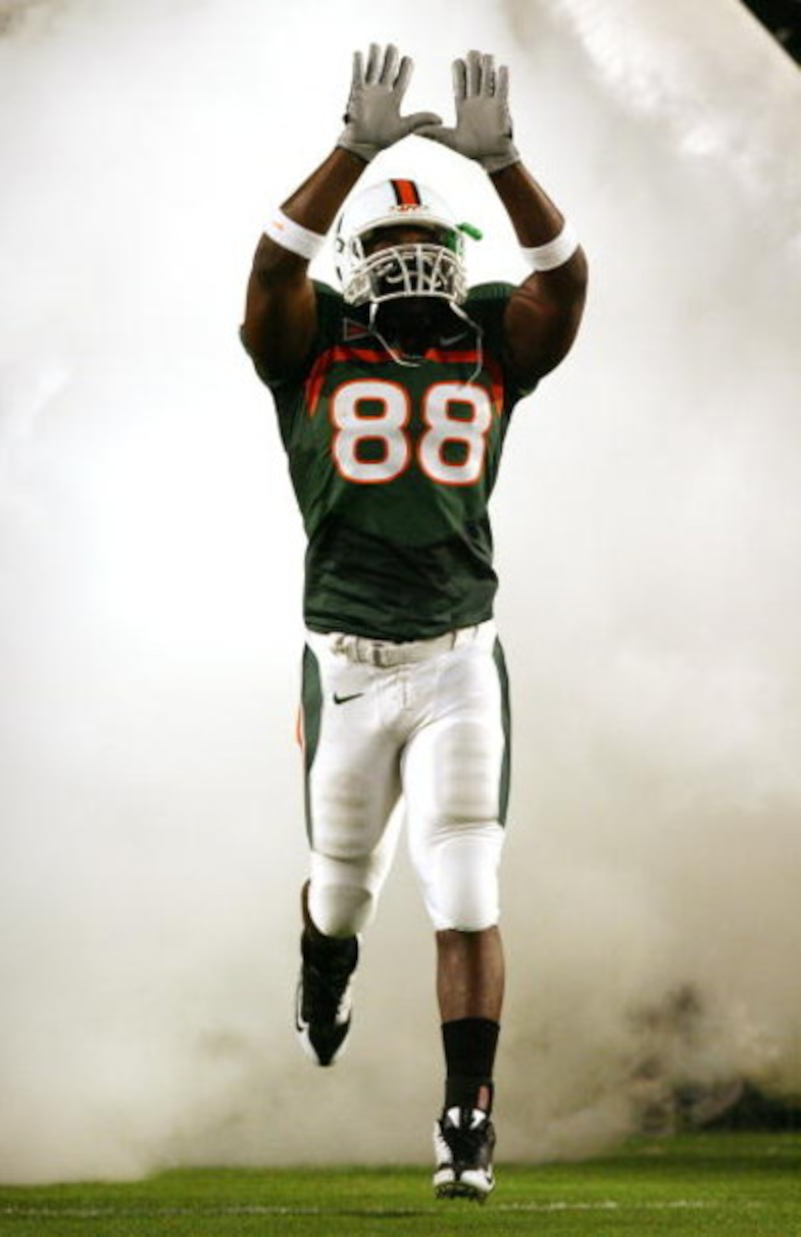 MIAMI - NOVEMBER 13:  Tight end Chris Zellner #88 of the Miami Hurricanes runs out of the tunnel during introductions prior to taking on the Virginia Tech Hokies at Dolphin Stadium on November 13, 2008 in Miami, Florida.  (Photo by Doug Benc/Getty Images)
