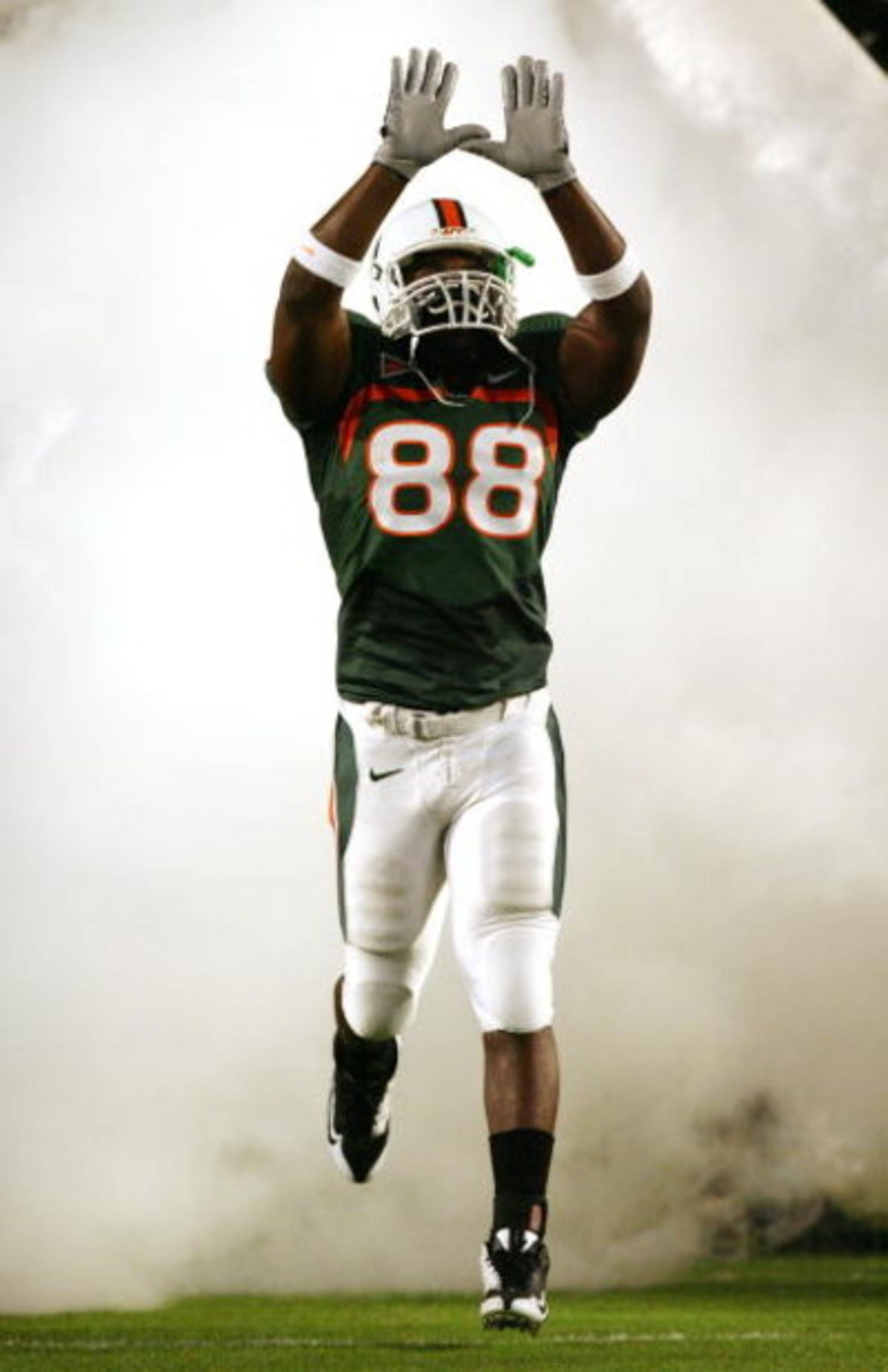 MIAMI - NOVEMBER 13:  Tight end Chris Zellner #88 of the Miami Hurricanes runs out of the tunnel during introductions prior to taking on the Virginia Tech Hokies at Dolphin Stadium on November 13, 2008 in Miami, Florida.  (Photo by Doug Benc/Getty Images)