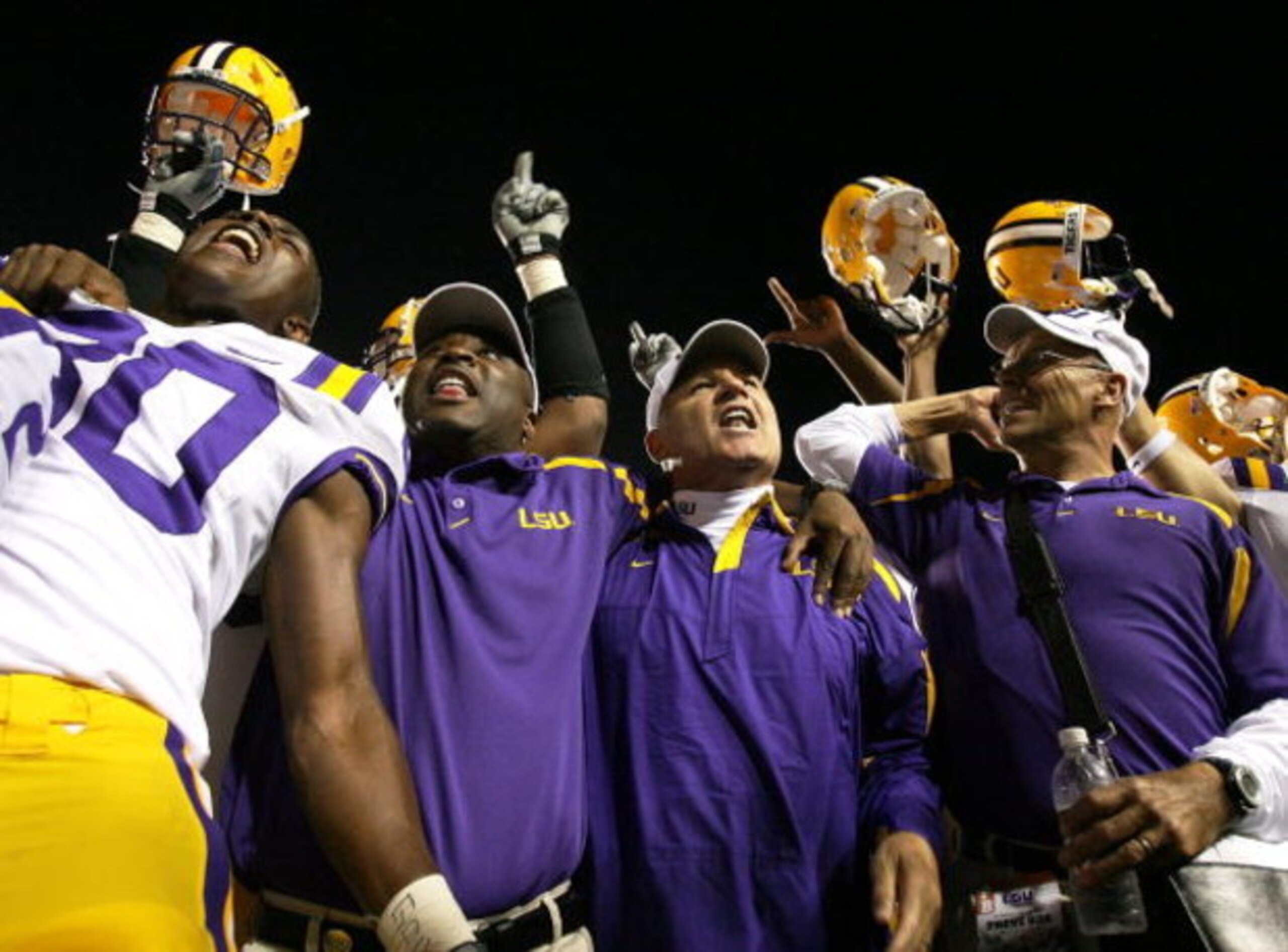 BATON ROUGE, LA - OCTOBER 20:  Head coach Les Miles of the LSU Tigers celebrates with teammates after defeating the Auburn Tigers at Tiger Stadium on October 20, 2007 in Baton Rouge, Louisiana. LSU defeated Auburn 30-24.  (Photo by Doug Benc/Getty Images)