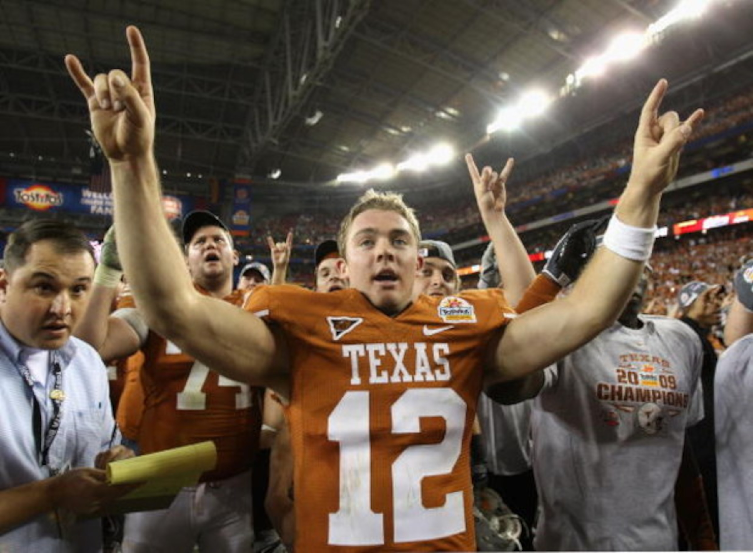 GLENDALE, AZ - JANUARY 05:  Quarterback Colt McCoy #12 of the Texas Longhorns celebrates after defeating the Ohio State Buckeyes in the Tostitos Fiesta Bowl Game on January 5, 2009 at University of Phoenix Stadium in Glendale, Arizona. The Longhorns defea