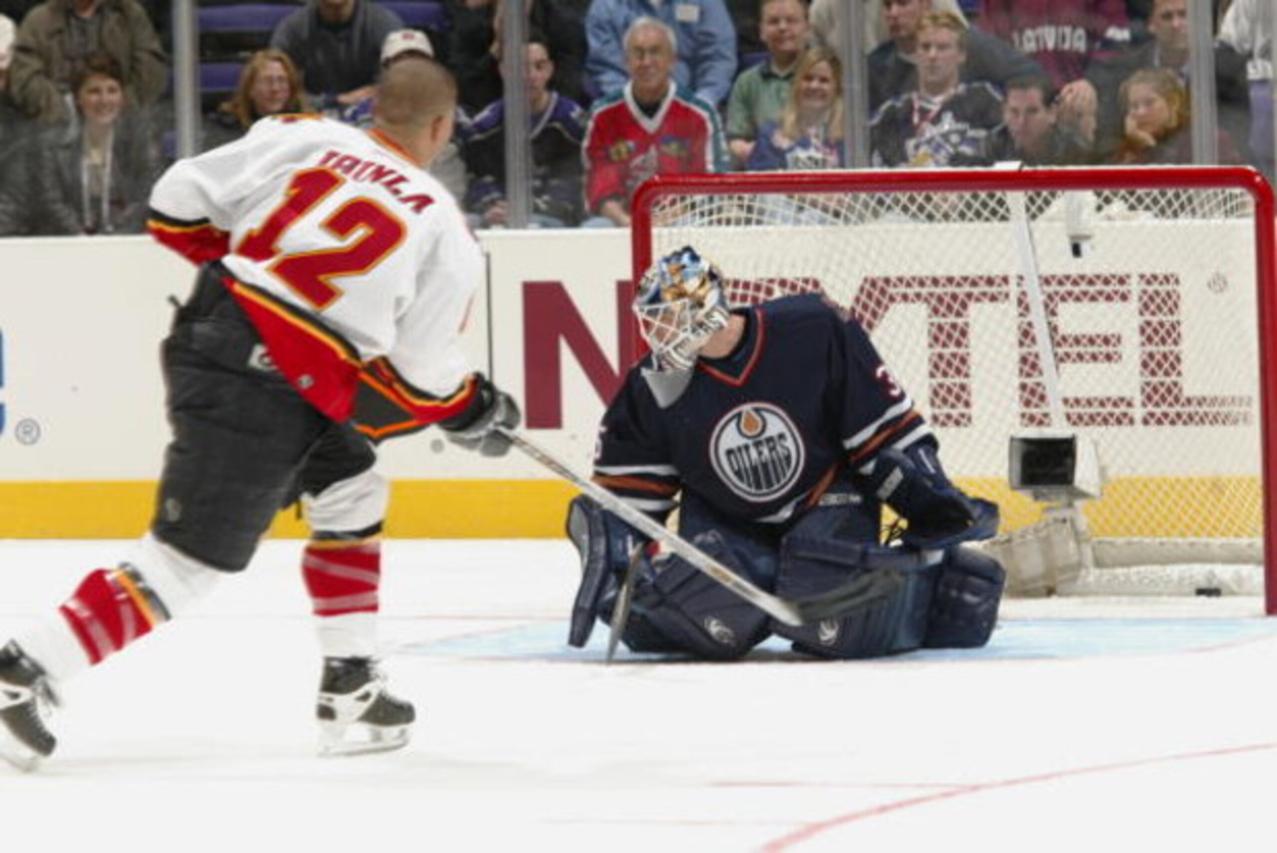 1 Feb 2002:   Goaltender Tommy Salo of the Edmonton Oilers stops a shot by Jarome Ignila of the Calgary Flames during the Dodge NHL SuperSkills competition at the Staples Center in Los Angeles, California.  The World defeated North America 21-11. DIGITAL 