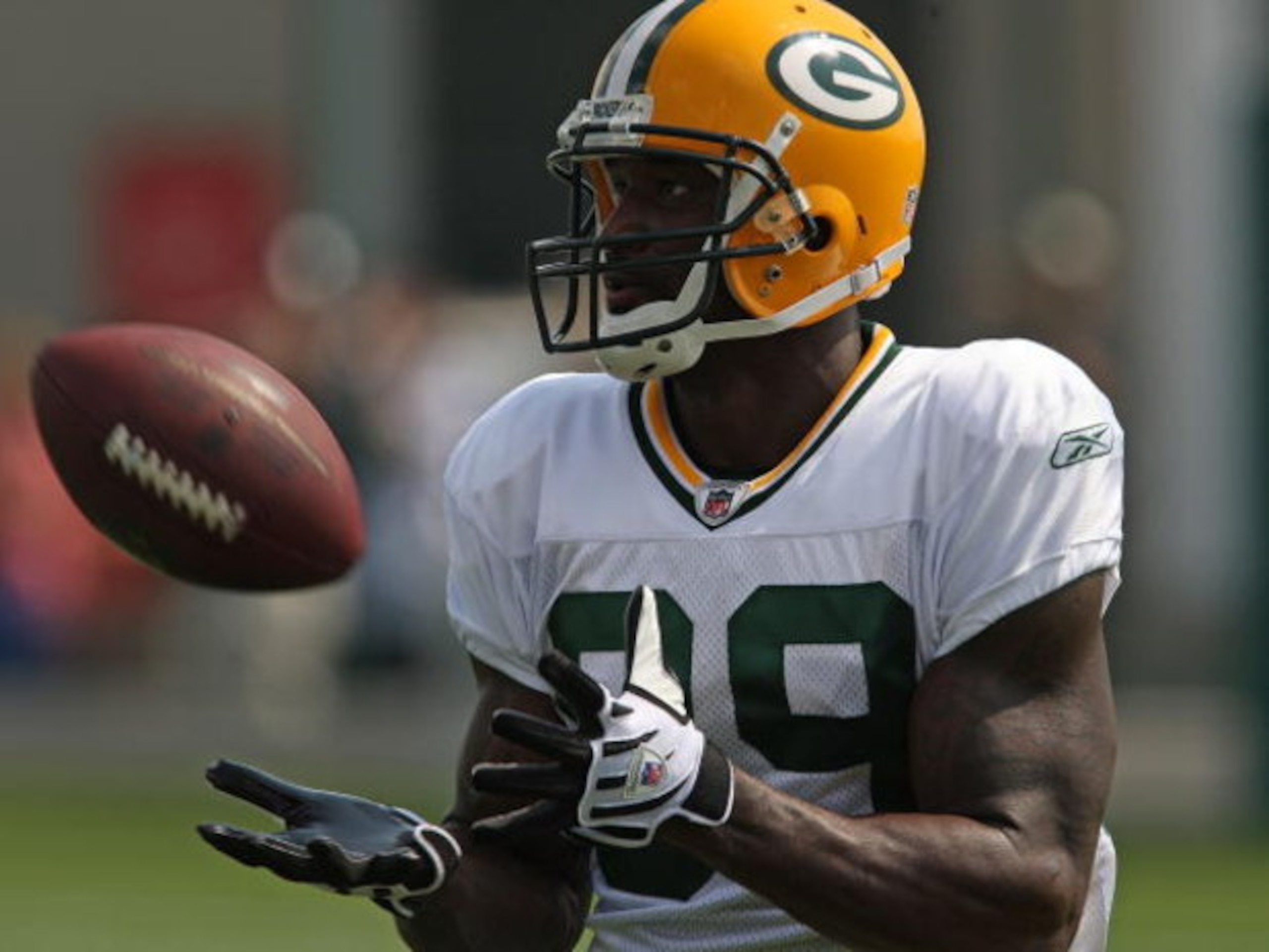 GREEN BAY, WI - AUGUST 03: James Jones #89 of the Green Bay Packers catches a pass during practice at summer training camp on August 3, 2009 at the Ray Nitschke Field in Green Bay, Wisconsin. (Photo by Jonathan Daniel/Getty Images)