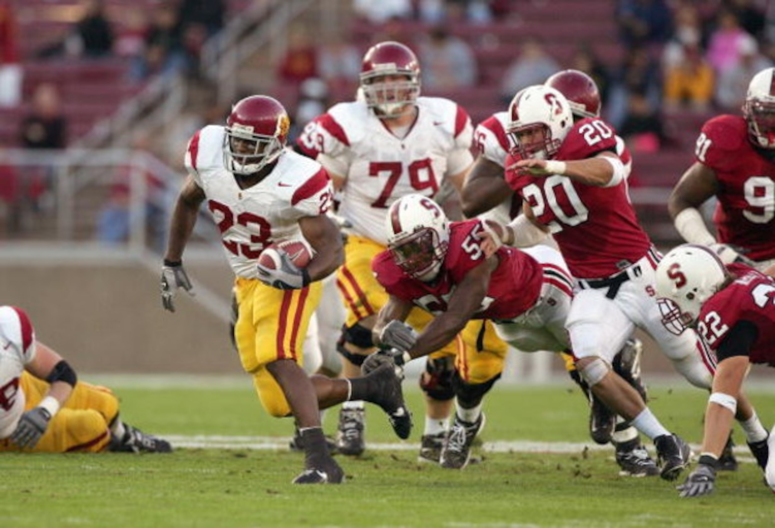 PALO ALTO, CA - NOVEMBER 4:  Chauncy Washington #23 of the USC Trojans carries the ball during the game against the Stanford Cardinal on November 4, 2006 at Stanford Stadium in Palo Alto, California. (Photo by Jed Jacobsohn/Getty Images)