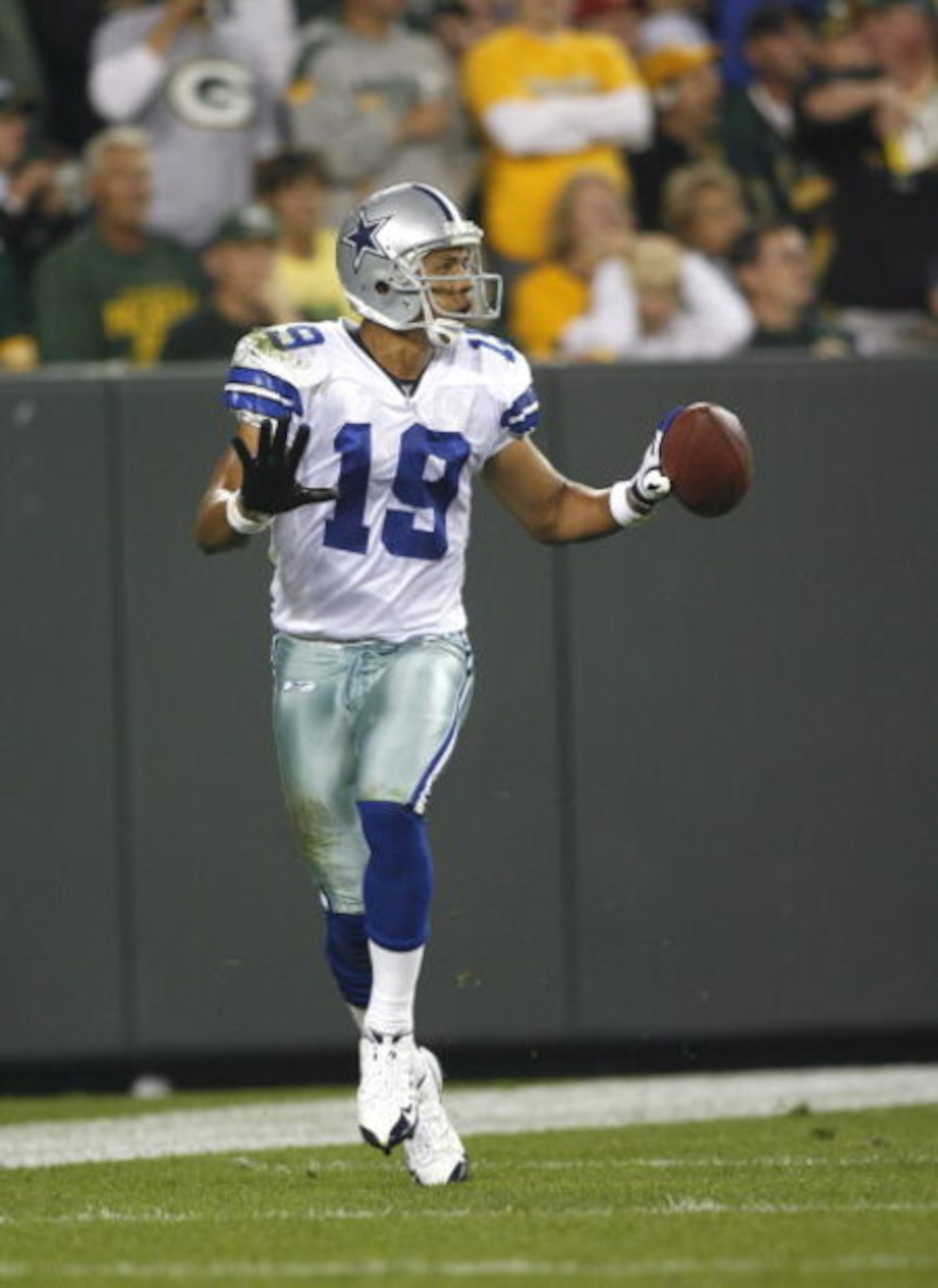 GREEN BAY - SEPTEMBER 21:  Miles Austin #19 of the Dallas Cowboys celebrates his touchdown against the Green  Bay Packers at Lambeau Field on September 21, 2008 in Green Bay, Wisconsin. The Cowboys defeated the Packers in 27- 16.  (Photo by Tom Hauck/Gett