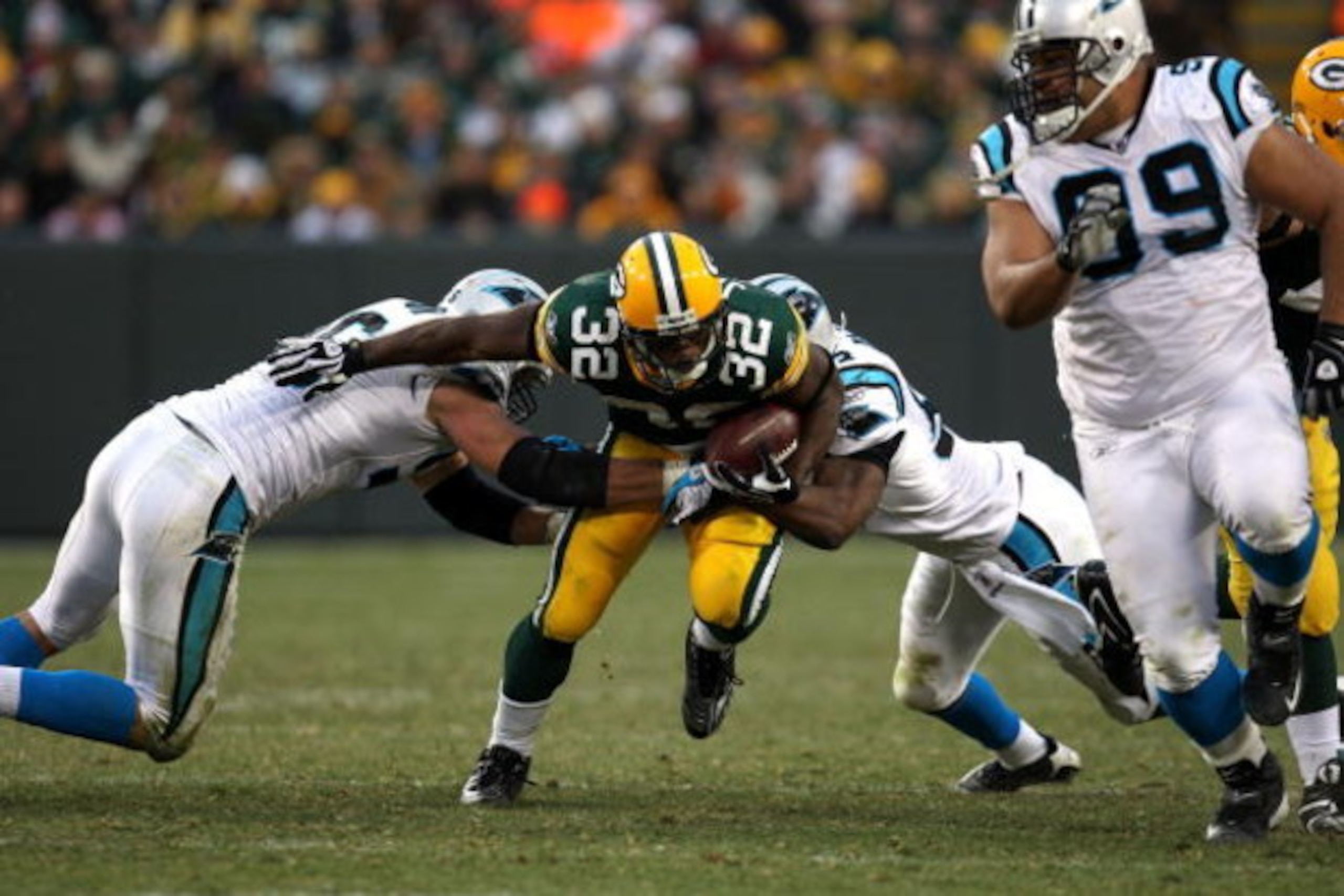 GREEN BAY, WI - NOVEMBER 30:  Brandon Jackson #32 of the Green Bay Packers runs the ball against the Carolina Panthers at Lambeau Field on November 30, 2008 in Green Bay, Wisconsin. The Panthers won 35-31.  (Photo by Jonathan Daniel/Getty Images)