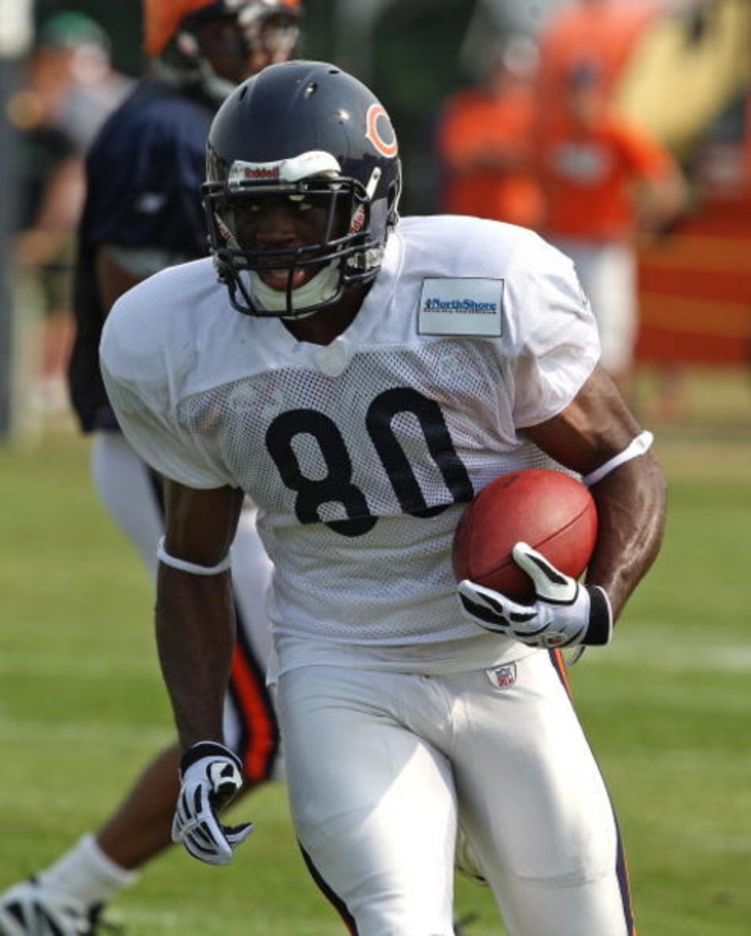 BOURBONNAIS, IL - AUGUST 04: Earl Bennett #80 of the Chicago Bears runs with the ball during a training camp practice on August 4, 2009 at Olivet Nazarene University in Bourbonnais, Illinois. (Photo by Jonathan Daniel/Getty Images)