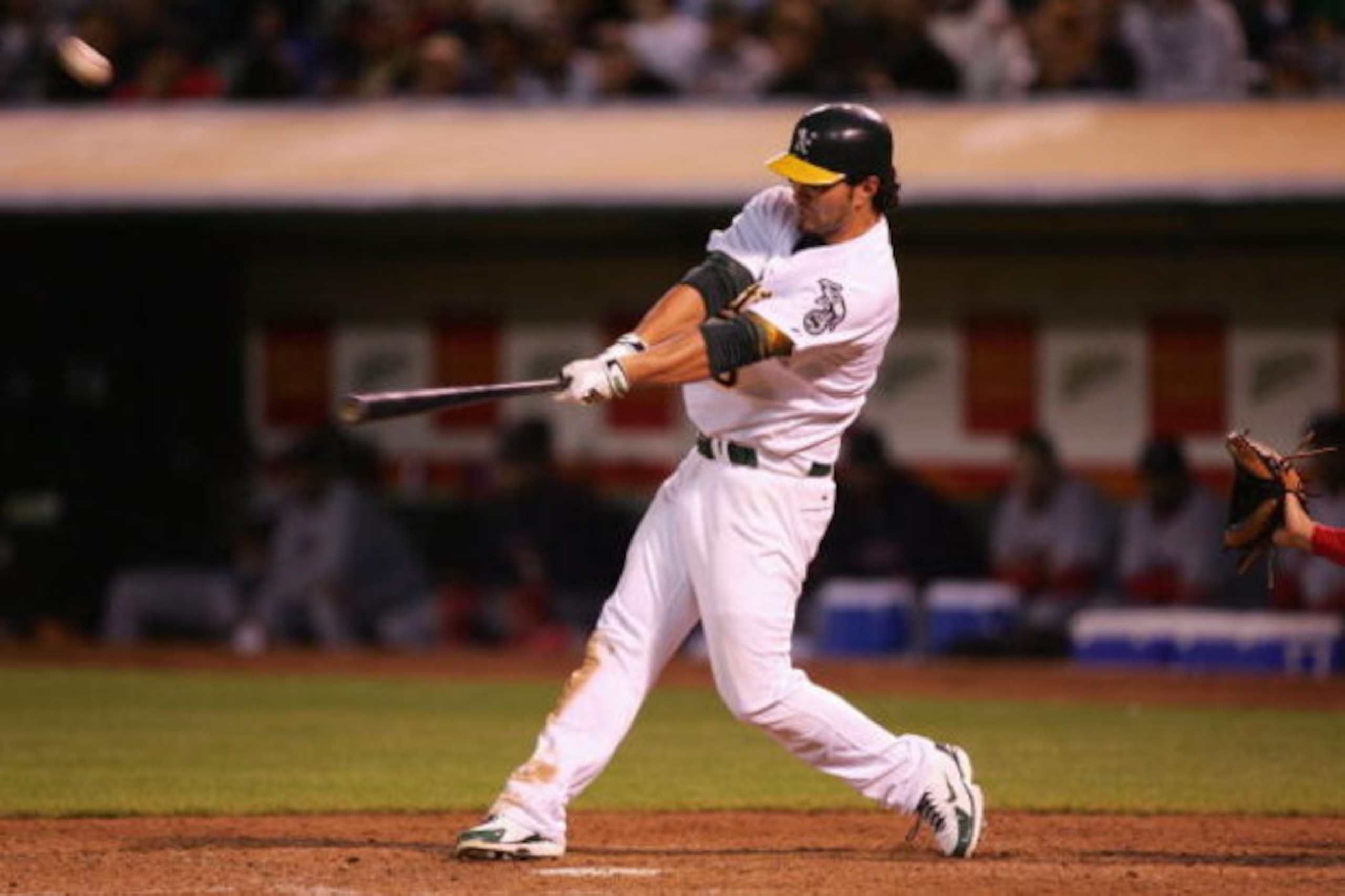 OAKLAND, CA - JUNE 04: Eric Chavez #3 of the Oakland Athletics hits a walk off home run in the 11th inning against the Boston Red Sox during a Major League Baseball game on June 4, 2007 at McAfee Coliseum in Oakland, California. (Photo by Jed Jacobsohn/ OAKLAND, CA - JUNE 04: Eric Chavez #3 of the Oakland Athletics hits a walk off home run in the 11th inning against the Boston Red Sox during a Major League Baseball game on June 4, 2007 at McAfee Coliseum in Oakland, California. (Photo by Jed Jacobsohn/