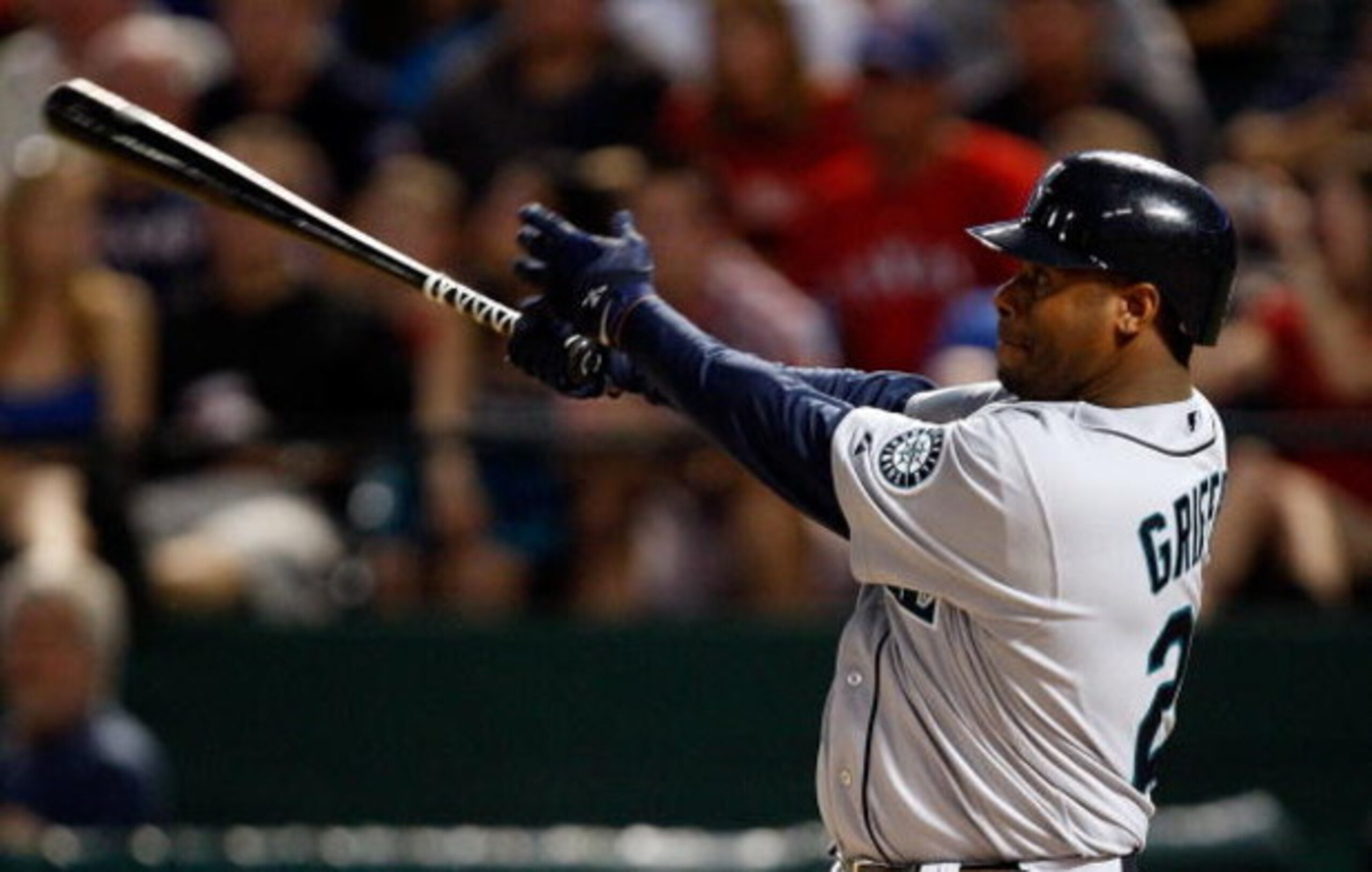 ARLINGTON, TX - JULY 31: Ken Griffey, Jr. #24 of the Seattle Mariners on July 31, 2009 at Rangers Ballpark in Arlington, Texas. (Photo by Ronald Martinez/Getty Images) ARLINGTON, TX - JULY 31: Ken Griffey, Jr. #24 of the Seattle Mariners on July 31, 2009 at Rangers Ballpark in Arlington, Texas. (Photo by Ronald Martinez/Getty Images)