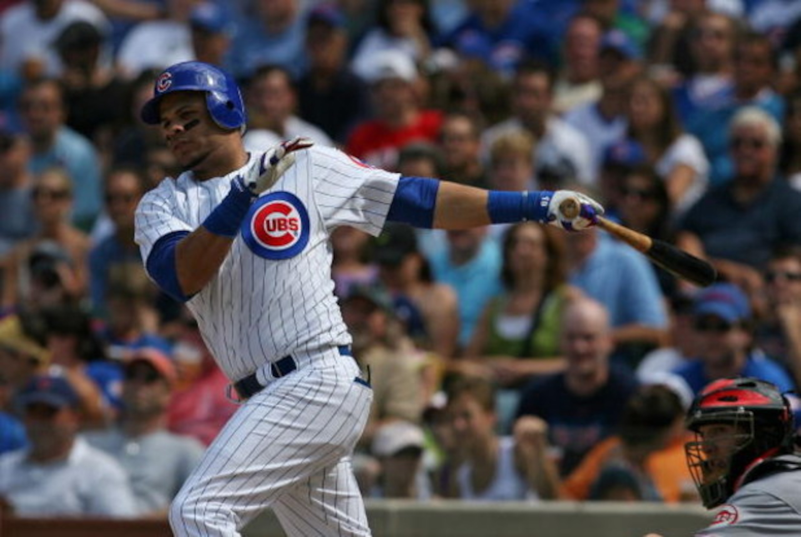 CHICAGO - JULY 26: Aramis Ramirez #16 of the Chicago Cubs hits a run-scoring double in the 7th inning against the Cincinnati Reds on July 26, 2009 at Wrigley Field in Chicago, Illinois. The Cubs defeated the Reds 5-2. (Photo by Jonathan Daniel/Getty Imag CHICAGO - JULY 26: Aramis Ramirez #16 of the Chicago Cubs hits a run-scoring double in the 7th inning against the Cincinnati Reds on July 26, 2009 at Wrigley Field in Chicago, Illinois. The Cubs defeated the Reds 5-2. (Photo by Jonathan Daniel/Getty Imag