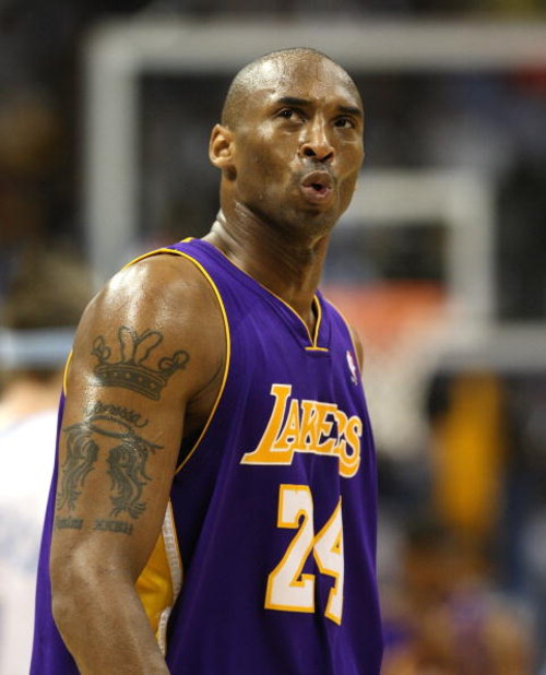 DENVER - MAY 25:  Kobe Bryant #24 of the Los Angeles Lakers looks on against the Denver Nuggets in Game Four of the Western Conference Finals during the 2009 NBA Playoffs at Pepsi Center on May 25, 2009 in Denver, Colorado. NOTE TO USER: User expressly ac