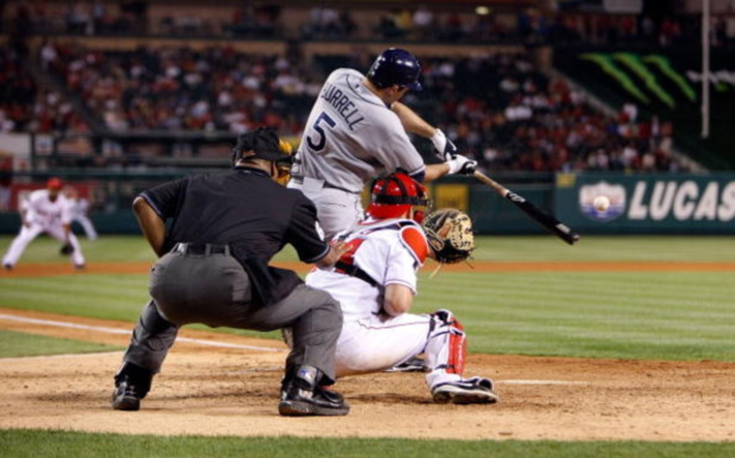 ANAHEIM, CA - AUGUST 10:  Pat Burrell #5 of the Tampa Bay Rays bats against the Los Angeles Angels of Anaheim at Angel Stadium on August 10, 2009 in Anaheim, California.  (Photo by Jeff Gross/Getty Images)