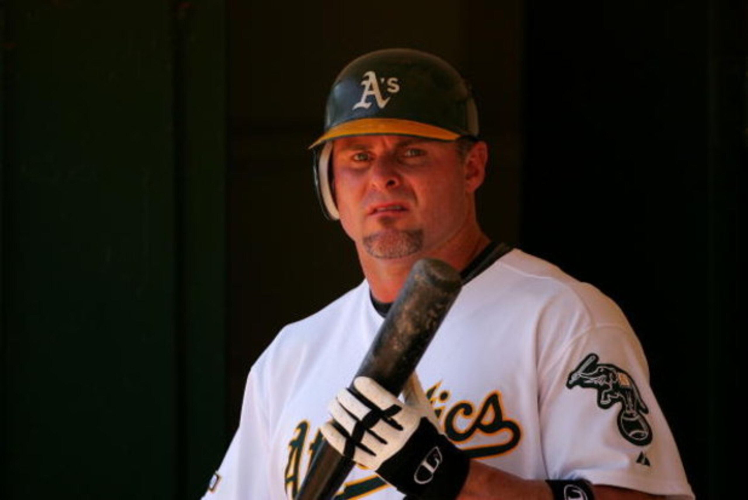 OAKLAND, CA - JUNE 28:  Jason Giambi #16 of the Oakland Athletics stands in the dugout during their game against the Colorado Rockies at the Oakland Coliseum on June 28, 2009 in Oakland, California.  (Photo by Ezra Shaw/Getty Images)
