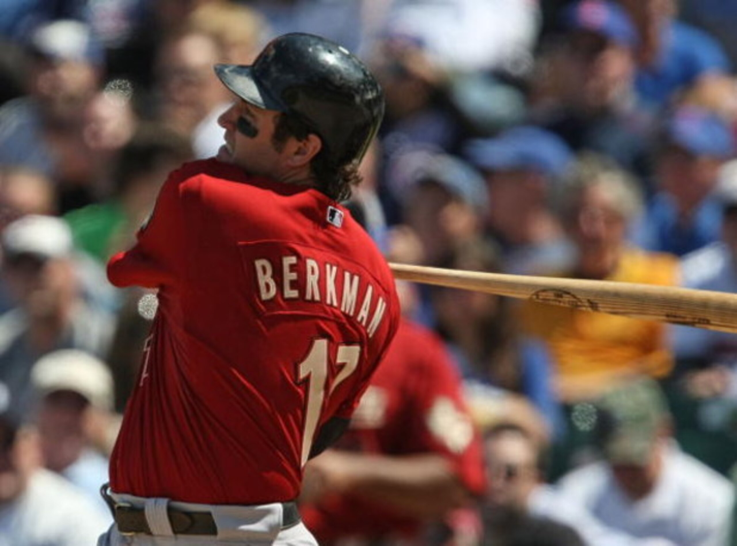 CHICAGO - MAY 16: Lance Berkman #17 of the Houston Astros hits a home run in the 9th inning against the Chicago Cubs on May 16, 2009 at Wrigley Field in Chicago, Illinois. The Cubs defeated the Astros 5-4. (Photo by Jonathan Daniel/Getty Images)