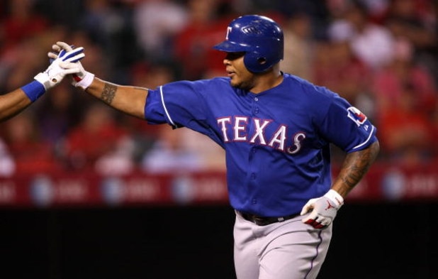 ANAHEIM, CA - JULY 08:  Andruw Jones #25 of the Texas Rangers celebrates after hitting his third home run of the game against the Los Angeles Angels of Anaheim in the fifth inning at Angel Stadium July 8, 2009 in Anaheim, California.  (Photo by Stephen Du