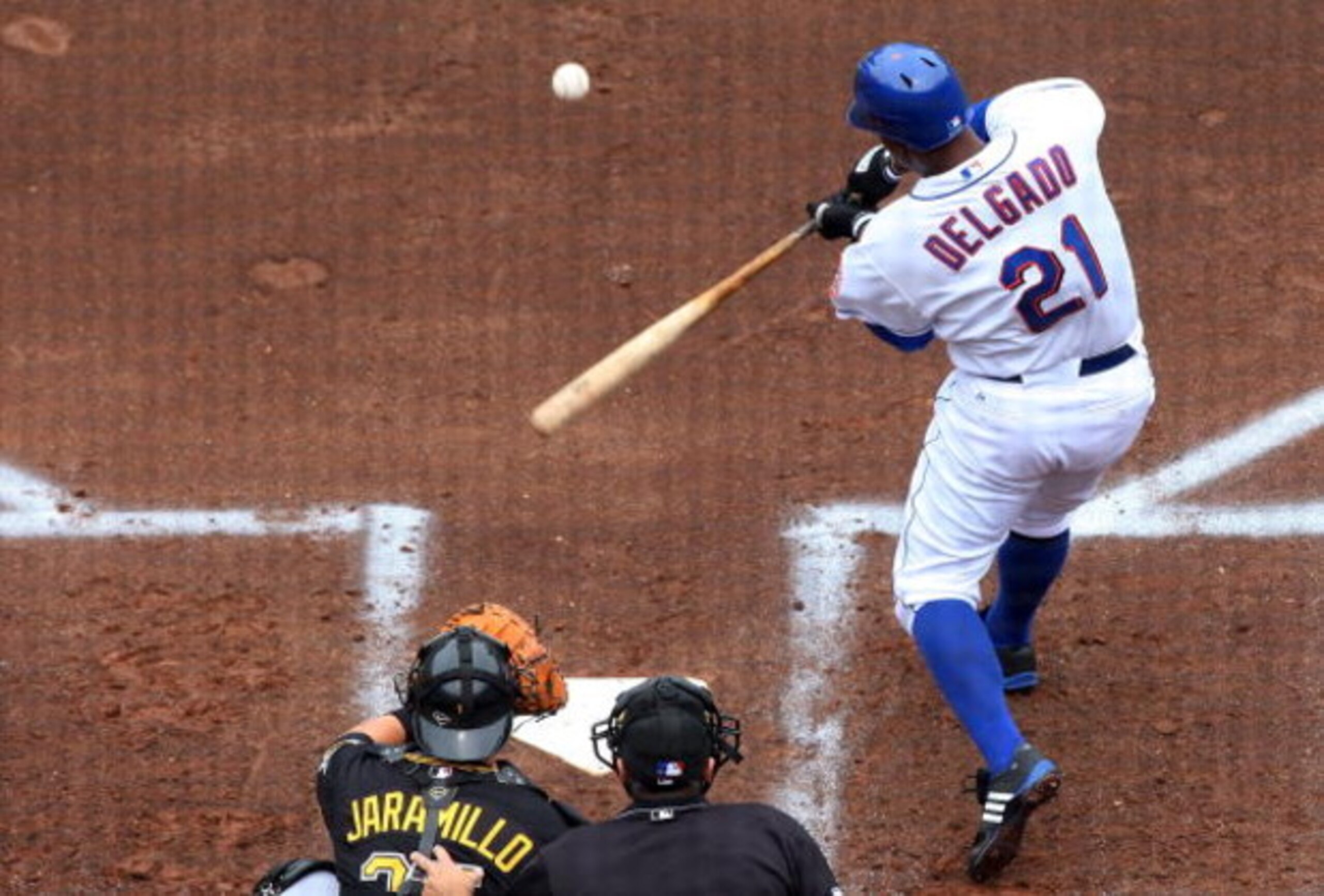 NEW YORK - MAY 09:  Carlos Delgado #21 of the New York Mets bats against the Pittsburgh Pirates on May 9, 2009 at Citi Field in the Flushing neighborhood of the Queens borough of New York City. The Mets defeated the Pirates 10-1.  (Photo by Jim McIsaac/Ge