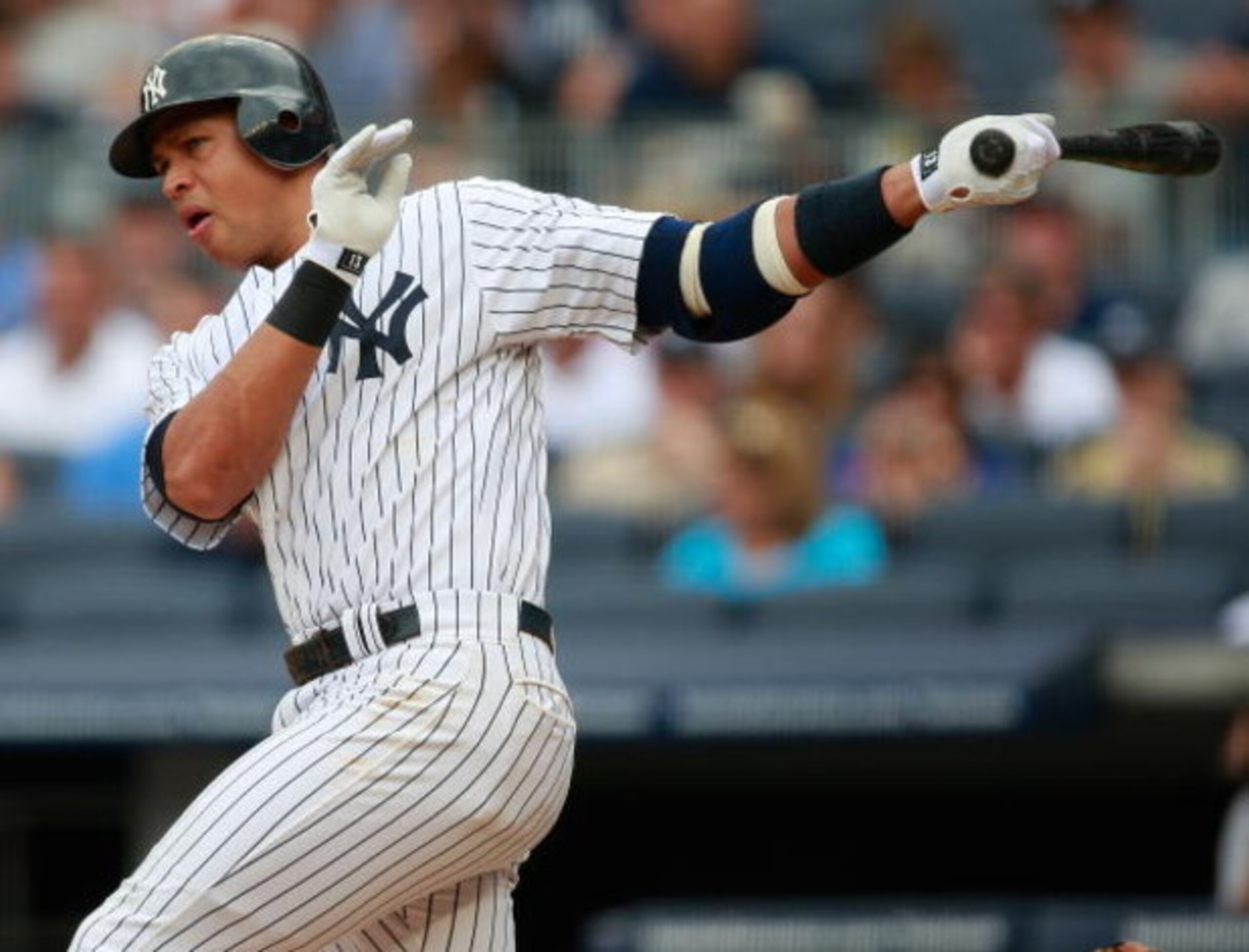 NEW YORK - AUGUST 12:  Alex Rodriguez #13 of the New York Yankees hits a single in the first inning during the game against the Toronto Blue Jays on August 12, 2009 at Yankee Stadium in the Bronx Borough of New York City. (Photo by Jared Wickerham/Getty I