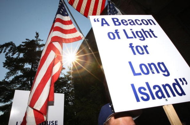 UNIONDALE, NY - AUGUST 04:  Fans rally for support at Lot 8 of the Nassau Coliseum prior to marching to the Lighthouse project public hearing at the Adams Playhouse on the campus of Hofstra University on August 4, 2009  in Uniondale, New York.  (Photo by 