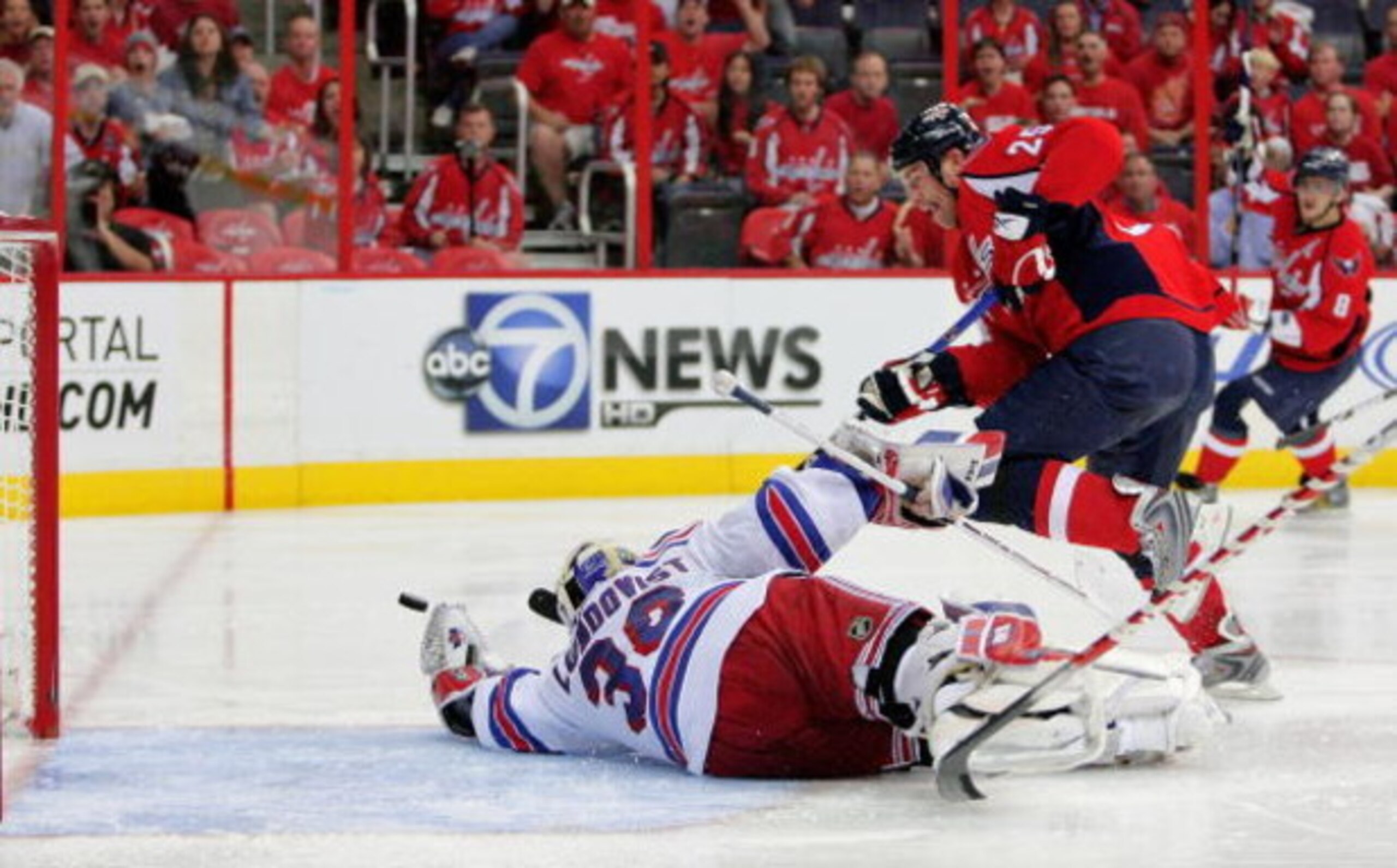 WASHINGTON - APRIL 28:  Viktor Kozlov #25 of the Washington Capitals takes a shot on goal against Henrik Lundqvist #30 of the New York Rangers during Game Seven of the Eastern Conference Quarterfinal Round of the 2009 Stanley Cup Playoffs on April 28, 200