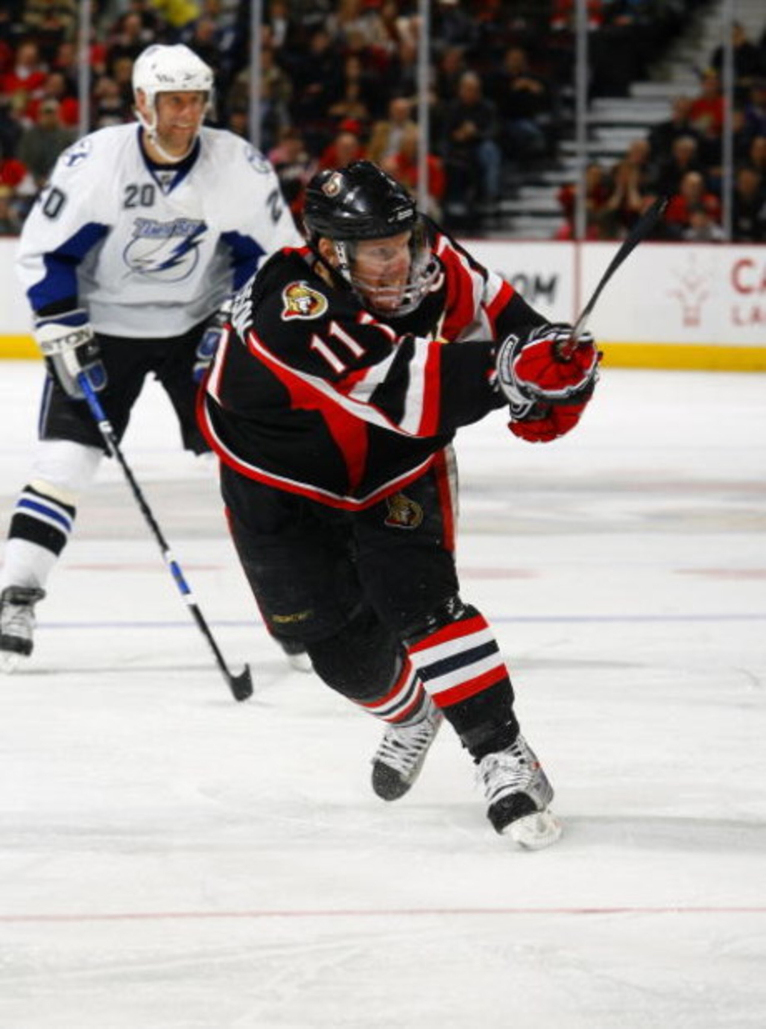 OTTAWA - MARCH 11:  Daniel Alfredsson #11 of the Ottawa Senators fires a slapshot from the top of the circle in a game against the Tampa Bay Lightning on March 11, 2009 at the Scotiabank Place in Ottawa, Canada. (Photo by Phillip MacCallum/Getty Images)