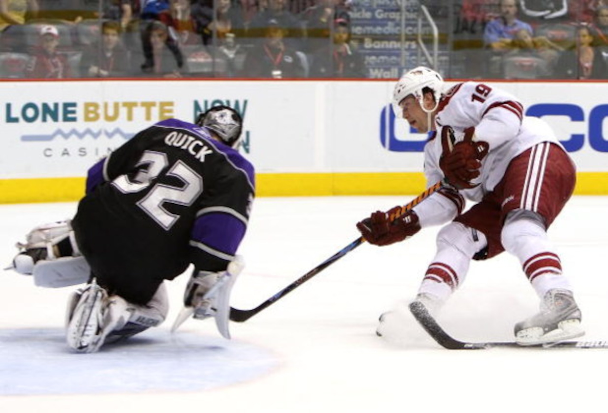 GLENDALE, AZ - APRIL 02:  Shane Doan #19 of the Phoenix Coyotes shoots the puck on goaltender Jonathan Quick #32 of the Los Angeles Kings during the NHL game at Jobing.com Arena on April 2, 2009 in Glendale, Arizona. The Coyotes defeated the Kings 2-1.  (