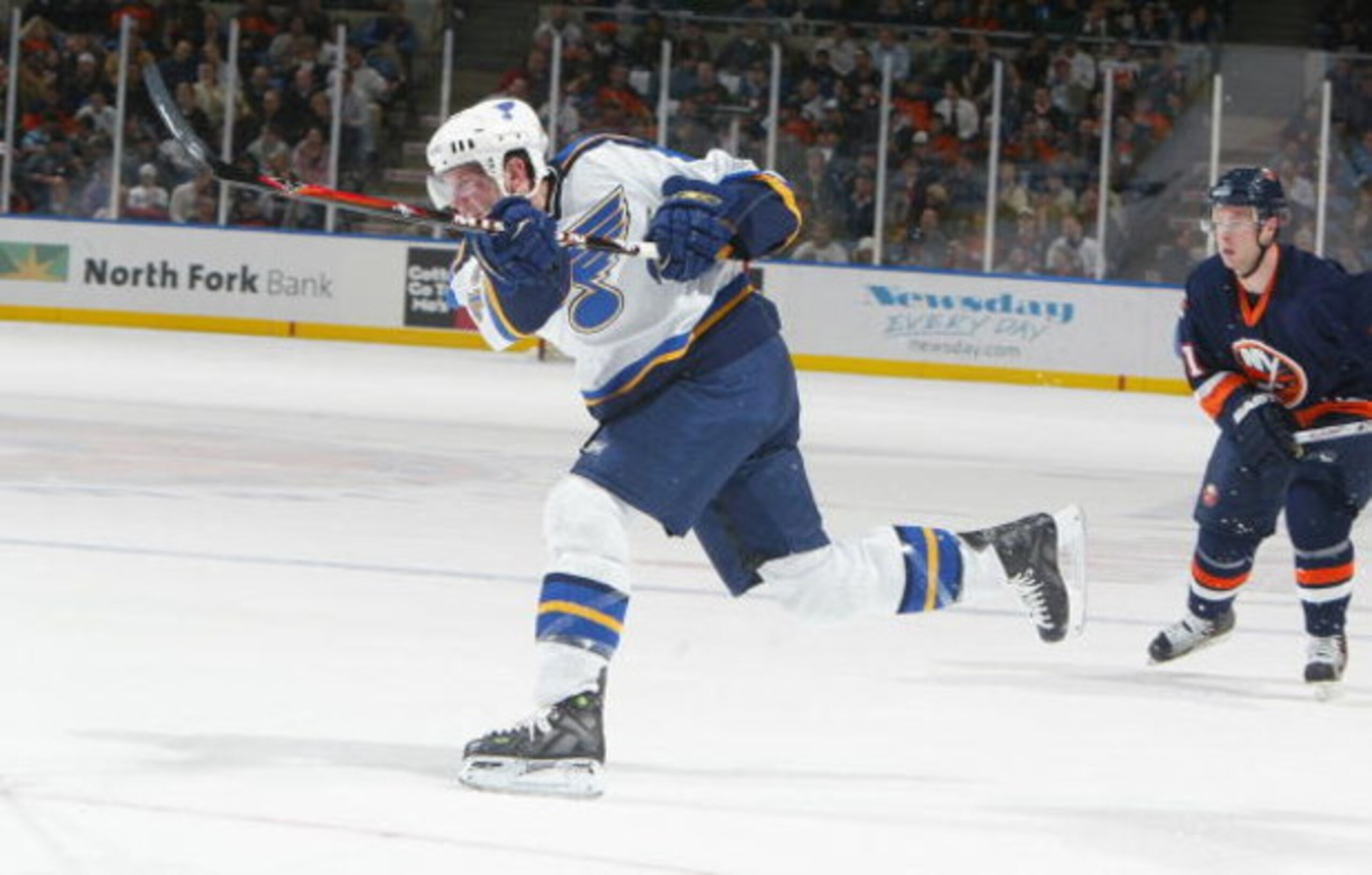 UNIONDALE, NY - MARCH 1:  David Backes #42 of the St. Louis Blues shoots the puck against the New York Islanders on March 1, 2007 at Nassau Coliseum in Uniondale, New York. The Blues won 3-2 in overtime. (Photo by Jim McIsaac/Getty Images)