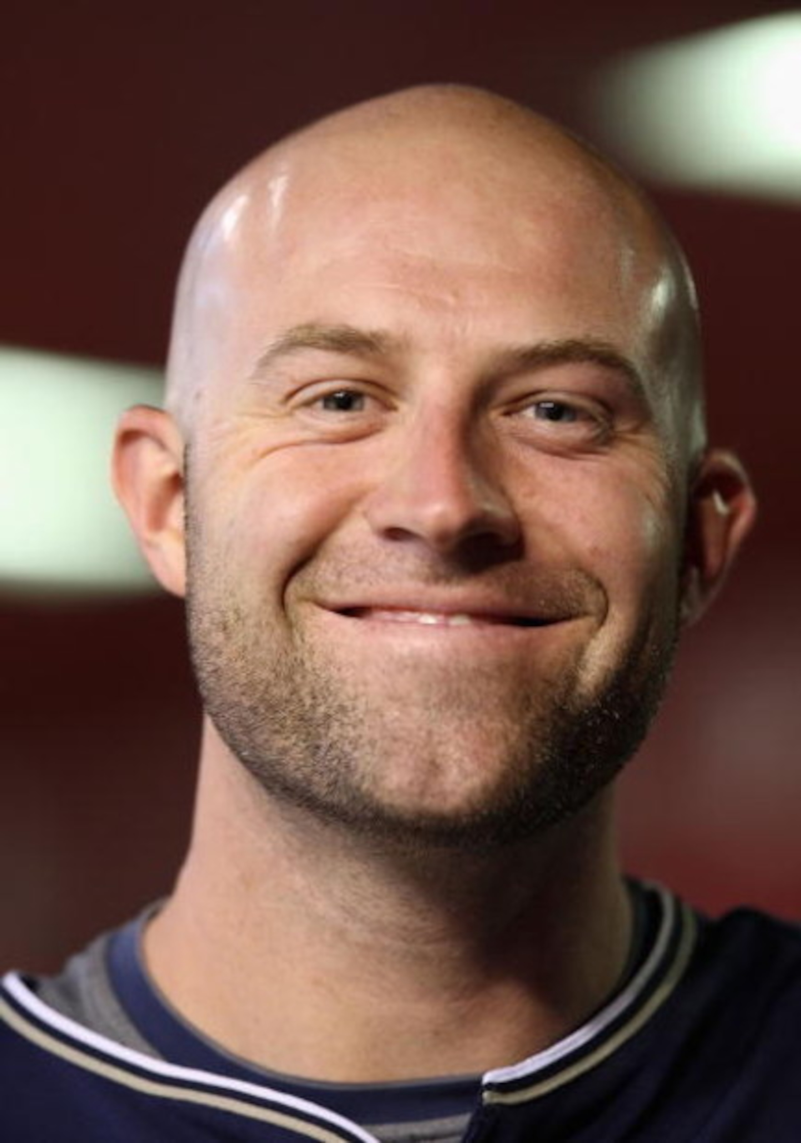 PHOENIX - MAY 25:  Kevin Kouzmanoff #5 of the San Diego Padres stands in the dugout during the major league baseball game agaisnt the Arizona Diamondbacks at Chase Field on May 25, 2009 in Phoenix, Arizona. The Padres defeated the Diamondbacks 9-7.  (Phot