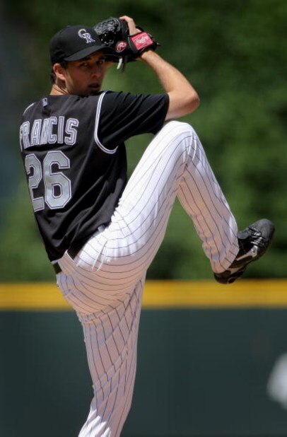 DENVER - MAY 24: Starting pitcher Jeff Francis #26 of the Colorado Rockies delivers against the New York Mets in the first inning at Coors Field on May 24, 2008 in Denver, Colorado. Francis collected the loss as the Mets defeated the Rockies 9-2. (Photo DENVER - MAY 24: Starting pitcher Jeff Francis #26 of the Colorado Rockies delivers against the New York Mets in the first inning at Coors Field on May 24, 2008 in Denver, Colorado. Francis collected the loss as the Mets defeated the Rockies 9-2. (Photo