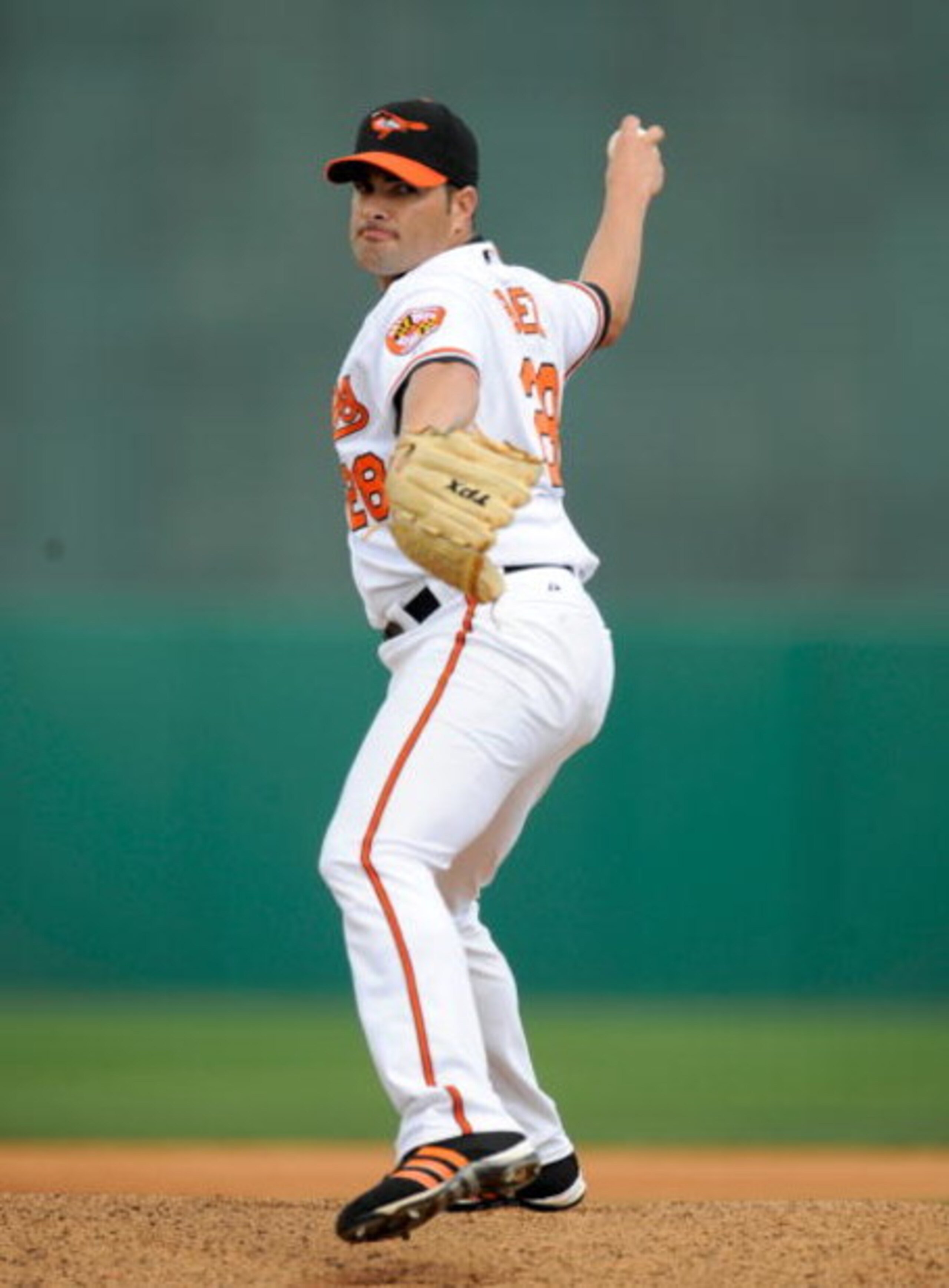 FORT LAUDERDALE, FL - FEBRUARY 26: Danys Baez #28 of the Baltimore Orioles pitches against the St Louis Cardinals during a spring training game at Fort Lauderdale Stadium on February 26, 2009 in Fort Lauderdale, Florida. (Photo by Rob Tringali/Getty Image