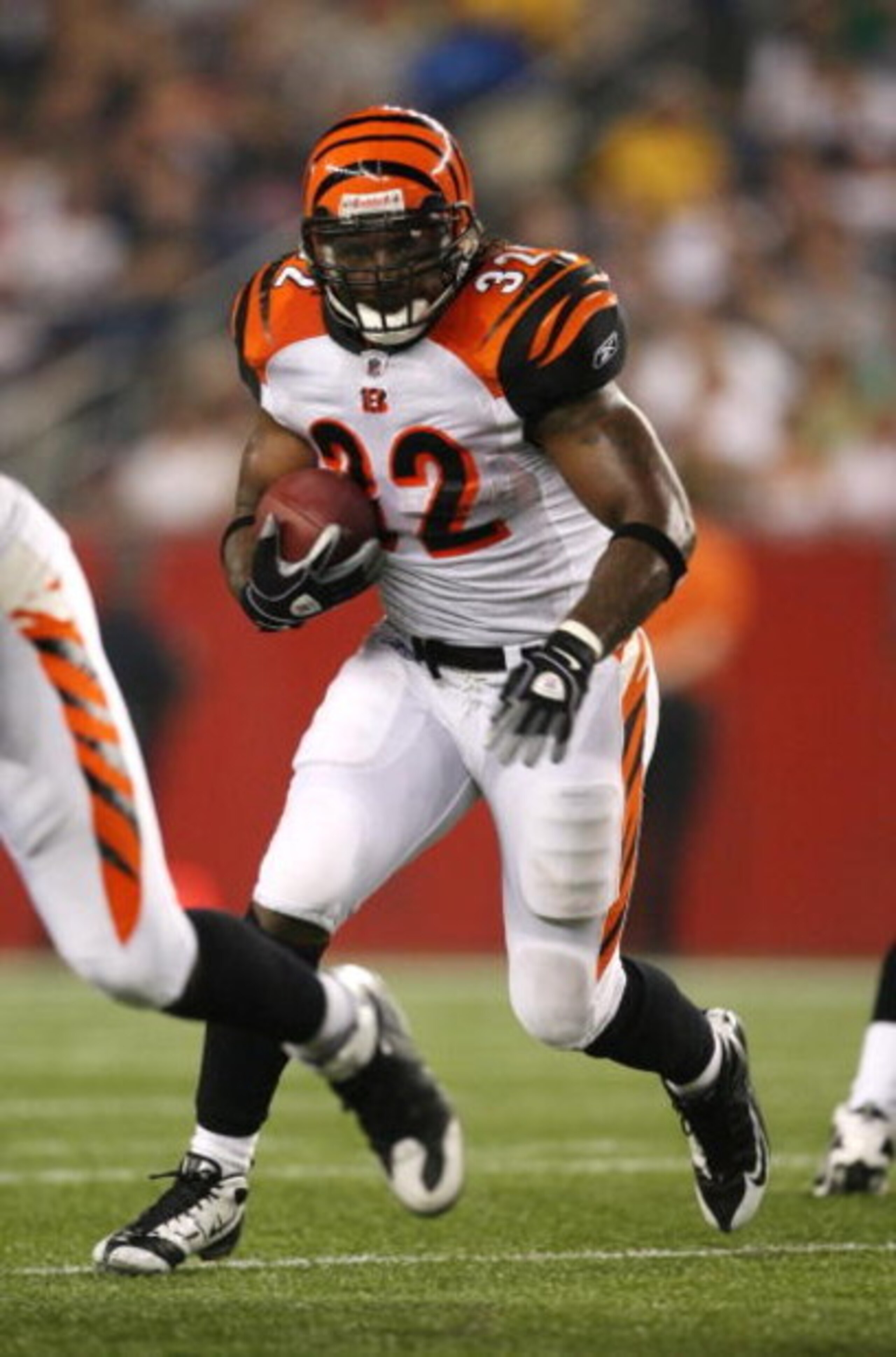 FOXBORO, MA - AUGUST 20:  Cedric Benson #32 of the Cincinnati Bengals runs the ball against the New England Patriots during their preseason game at Gillette Stadium on August 20, 2009 in Foxboro, Massachusetts.  (Photo by Jim Rogash/Getty Images)