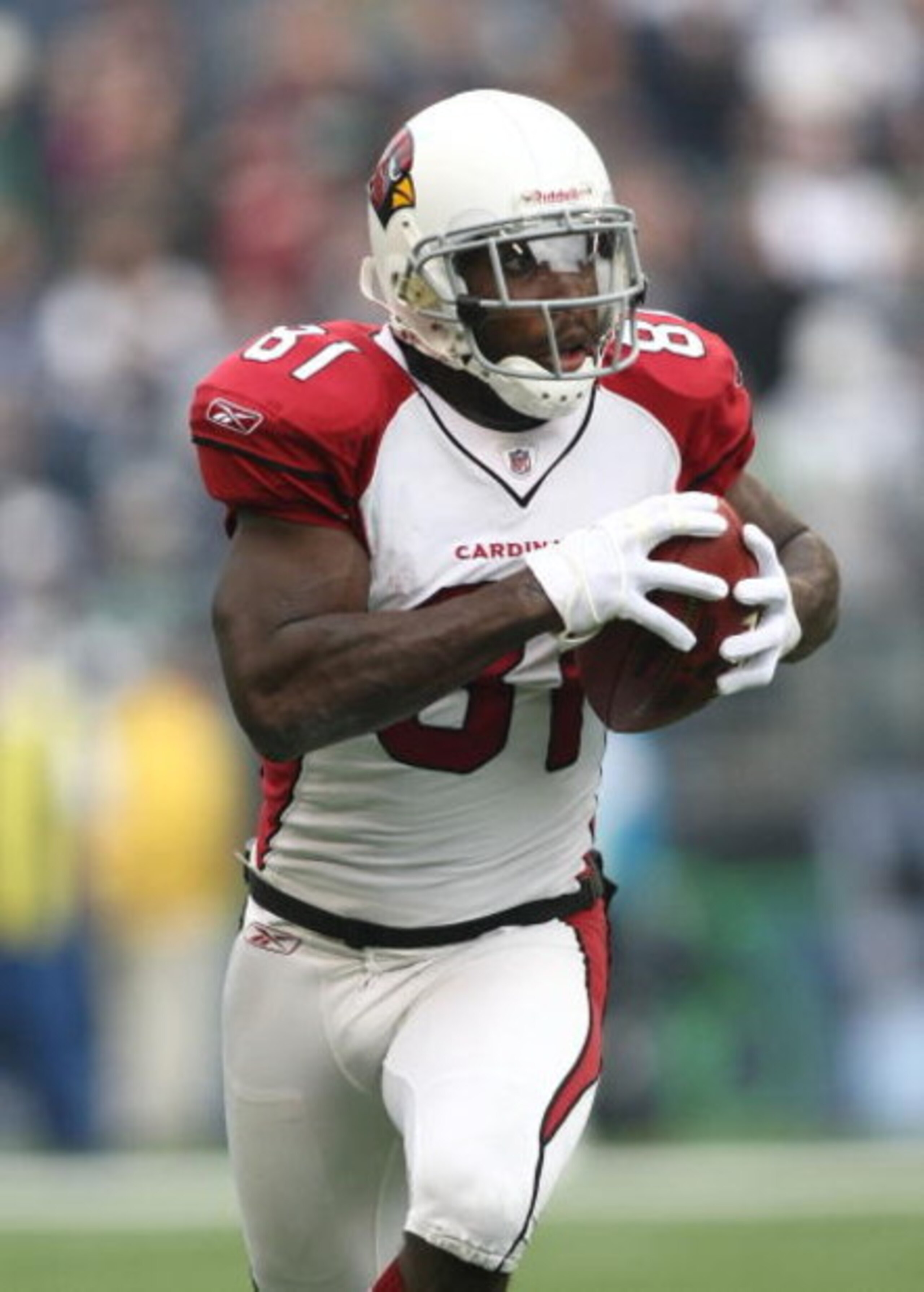 SEATTLE - NOVEMBER 16:  Anquan Boldin #81 of the Arizona Cardinalsruns with the ball against the Seattle Seahawks at Qwest Field on November 16, 2008 in Seattle, Washington.  (Photo by Jonathan Ferrey/Getty Images)