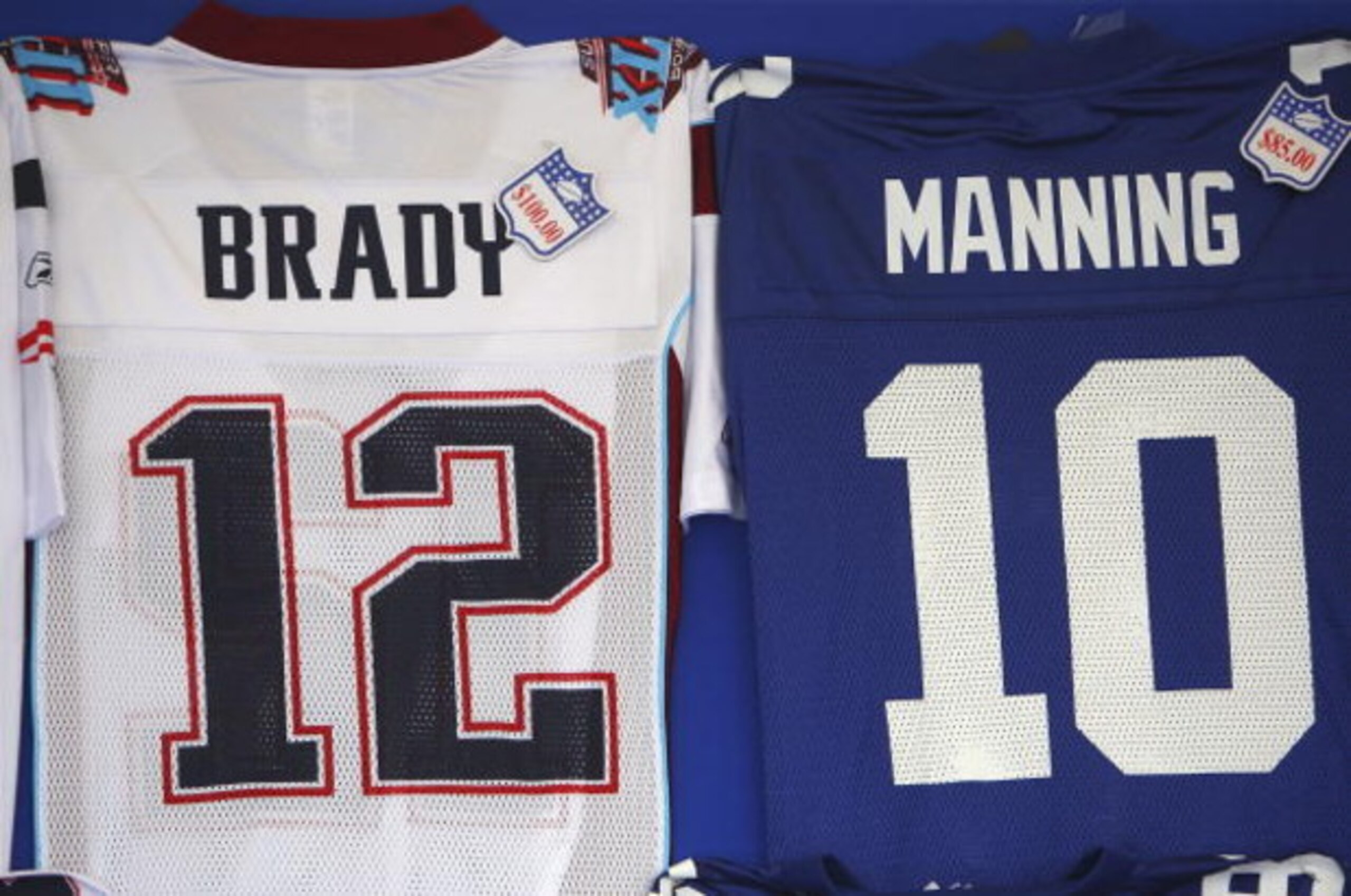 GLENDALE, AZ - FEBRUARY 03:  Jerseys are sold outside University of Phoenix Stadium before Super Bowl XLII between the New York Giants and the New England Patriots on February 3, 2008 in Glendale, Arizona.  (Photo by Donald Miralle/Getty Images)
