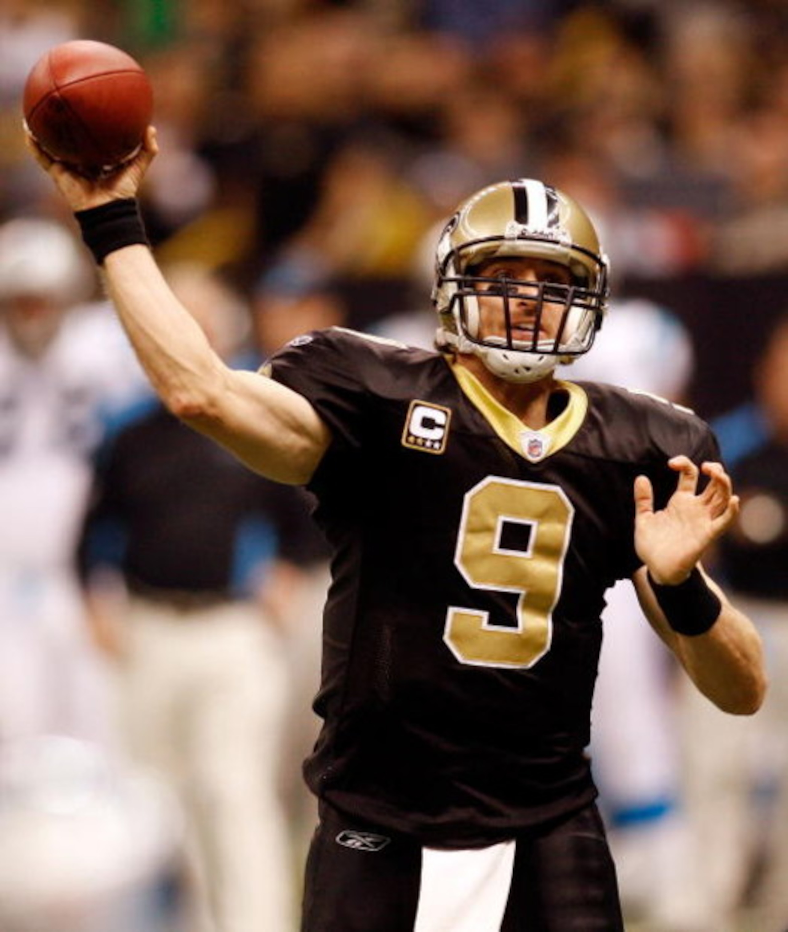 NEW ORLEANS - DECEMBER 28:  Drew Brees #9 of the New Orleans Saints looks to throw a pass against the Carolina Panthers on December 28, 2008 at the Superdome in New Orleans, Louisiana.  (Photo by Chris Graythen/Getty Images)