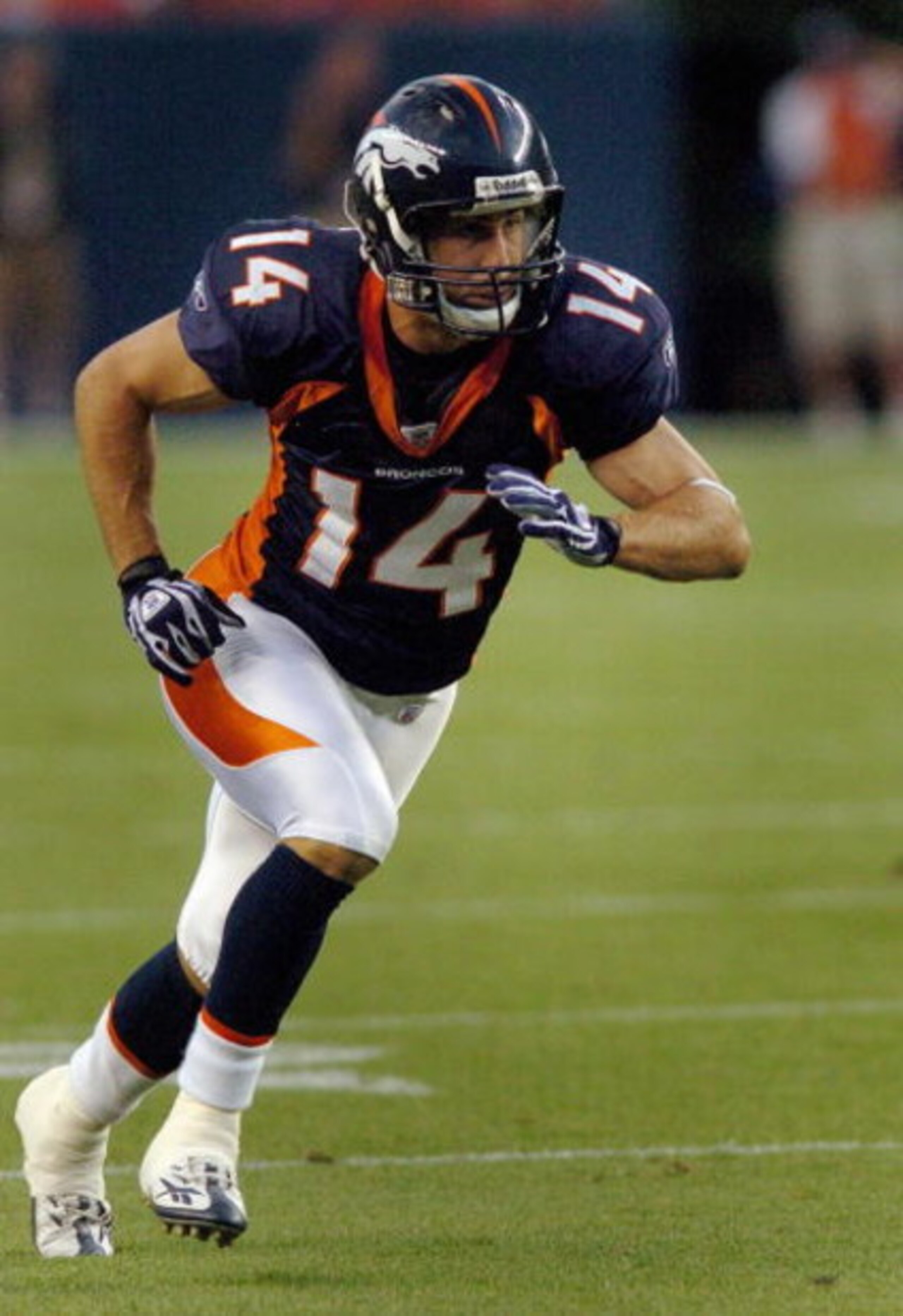 DENVER - AUGUST 25:  Wide receiver Brandon Stokley #14 of the Denver Broncos heads out on a route in the first half of the pre-season football game against the Cleveland Browns on August 25, 2006 at Invesco Field at Mile High in Denver, Colorado.  (Photo 