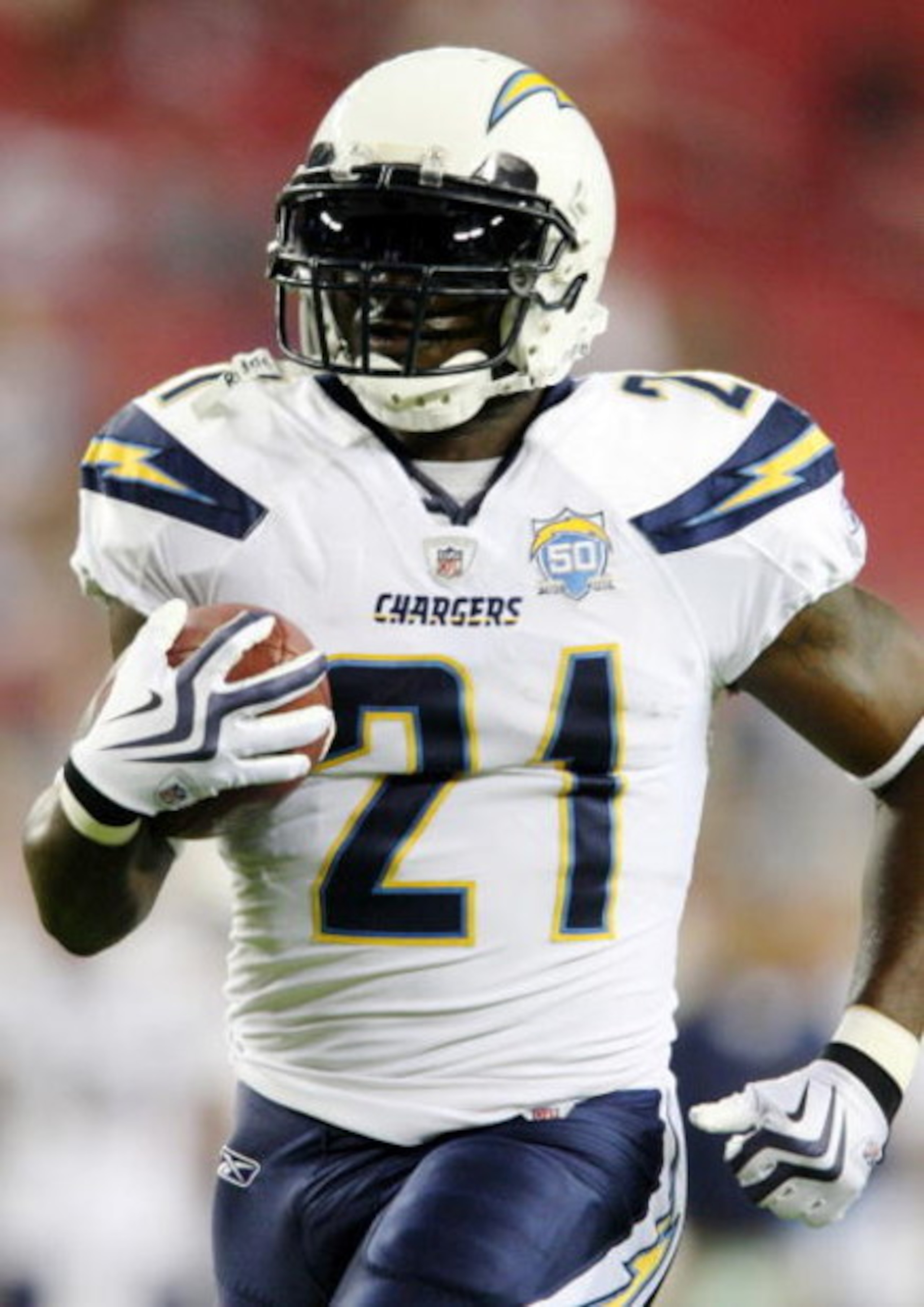 GLENDALE, ARIZONA - AUGUST 22:  LaDainian Tomlinson #21 of the San Diego Chargers carries the bal during the pre game warm up against  the Arizona Cardinals at the University of Phoenix Stadium on August 22, 2009 in Glendale, Arizona. (Photo by Christian 