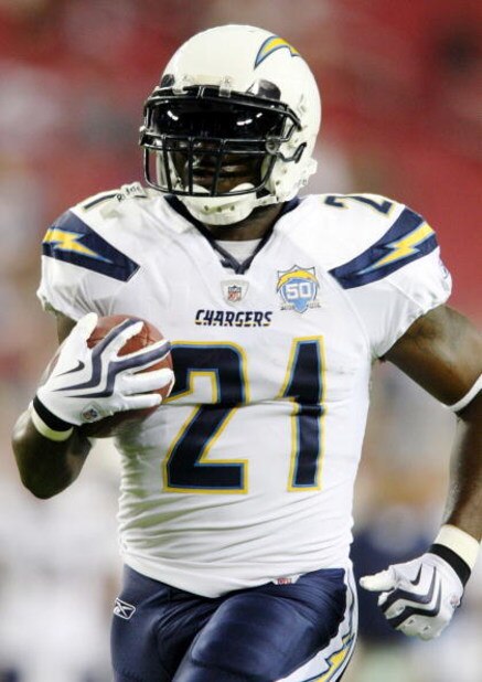 GLENDALE, ARIZONA - AUGUST 22:  LaDainian Tomlinson #21 of the San Diego Chargers carries the bal during the pre game warm up against  the Arizona Cardinals at the University of Phoenix Stadium on August 22, 2009 in Glendale, Arizona. (Photo by Christian 