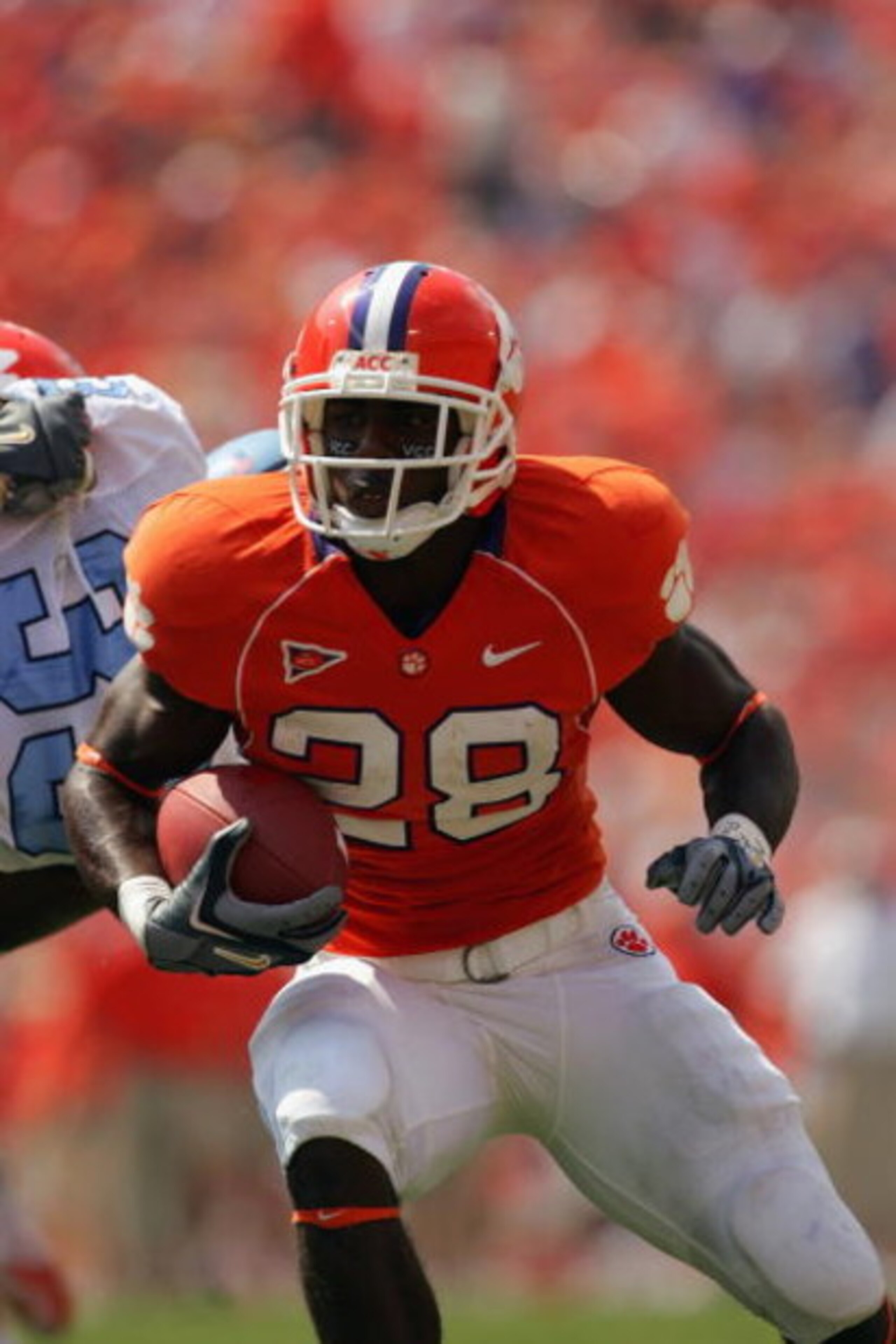 CLEMSON, SC - SEPTEMBER 23:  C.J. Spiller #28 of the Clemson Tigers runs runs with the ball as the Clemson Tigers host visiting University of North Carolina Tar Heels during their game on September 23, 2006 at Memorial Stadium in Clemson, South Carolina. 